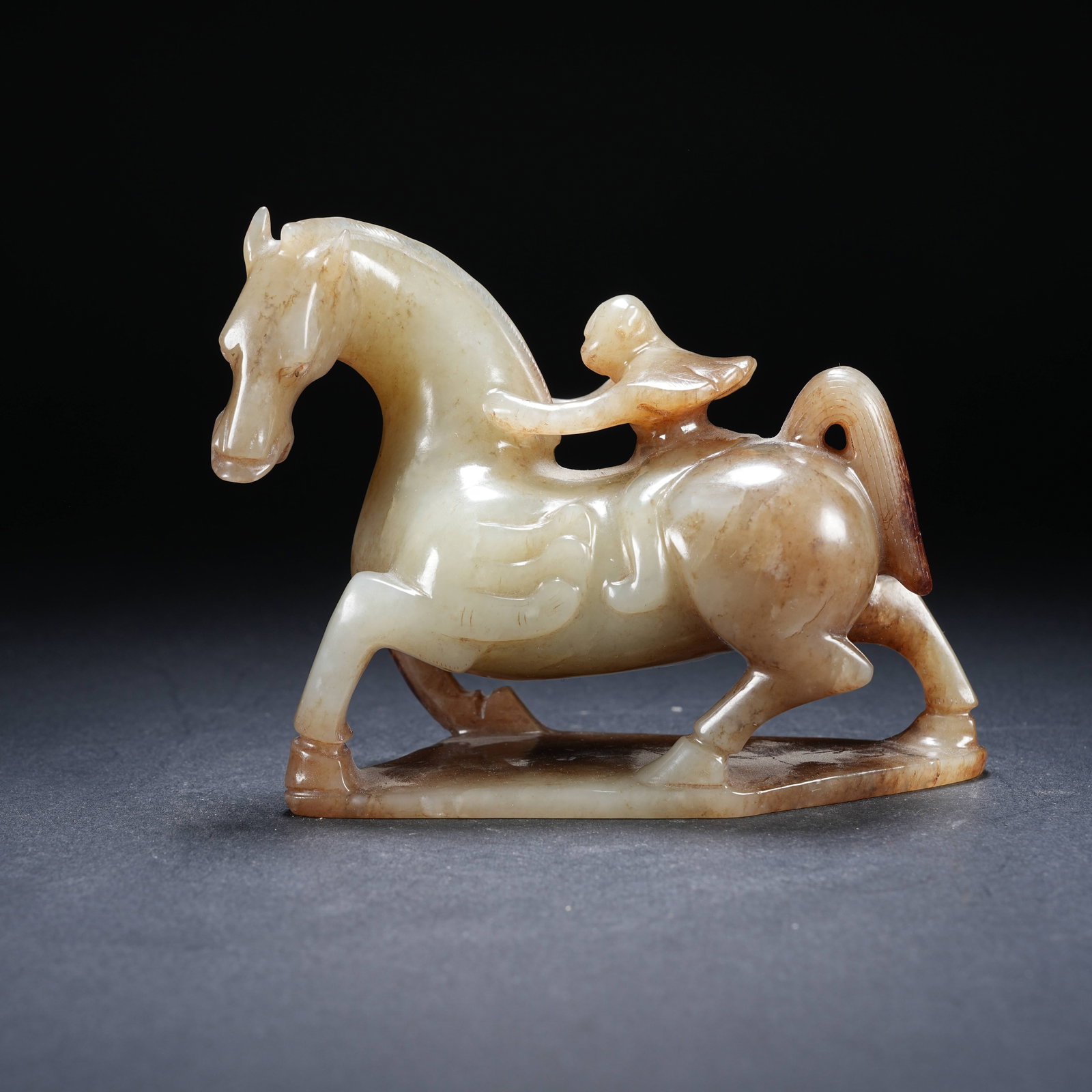 A ARCHAIC JADE FEATHERED MAN RIDING HORSE ORNAMENT (1 of 8)