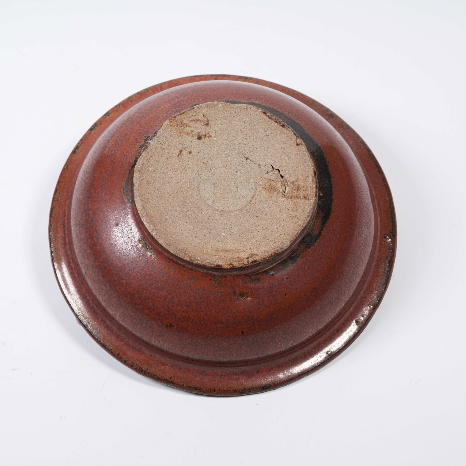 A PERSIMMON-RED GLAZE SMALL TWO-LOOP DISH - 9