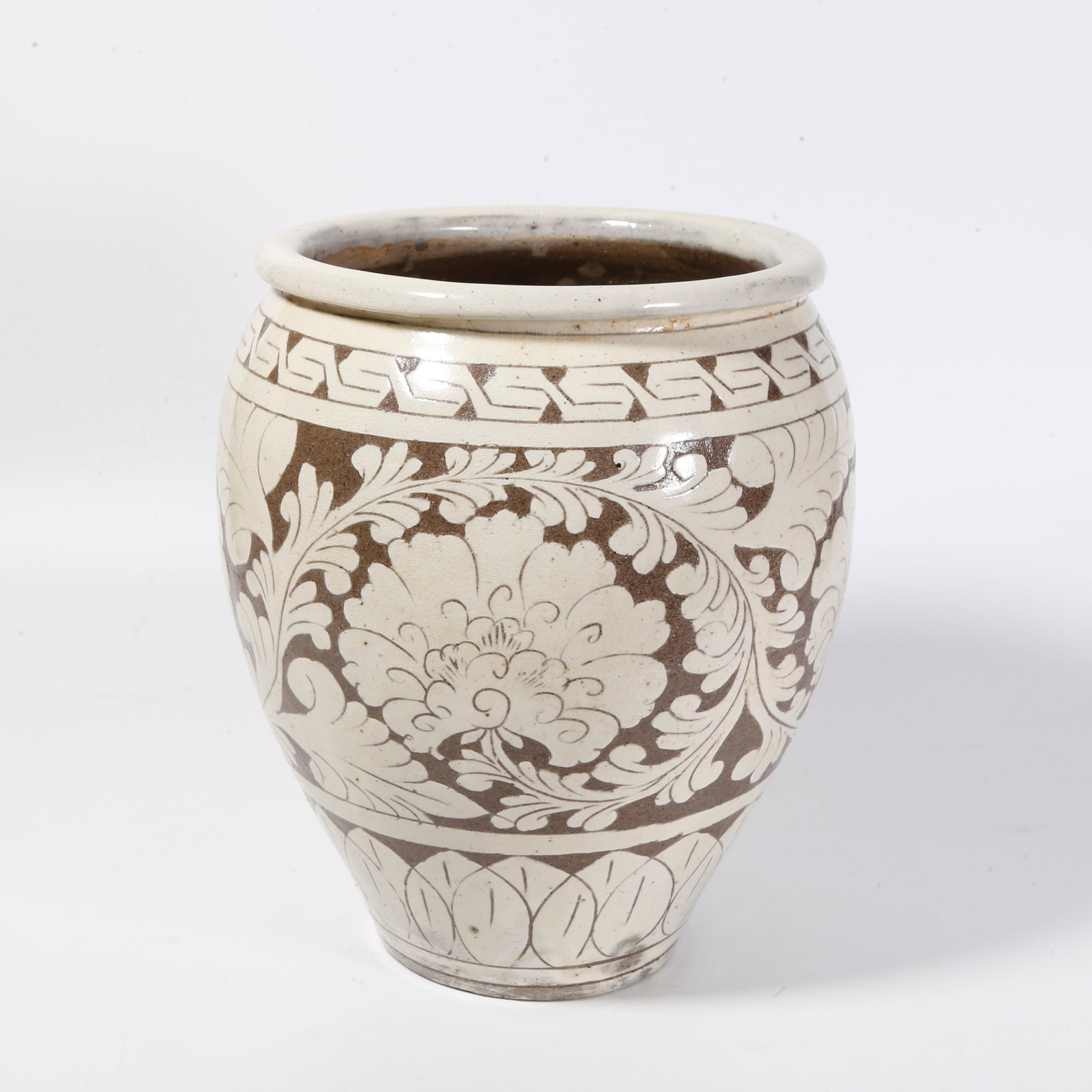 A CIZHOU KILN JAR WITH FLORAL PATTERN: Cizhou Kiln Jar with Floral Pattern