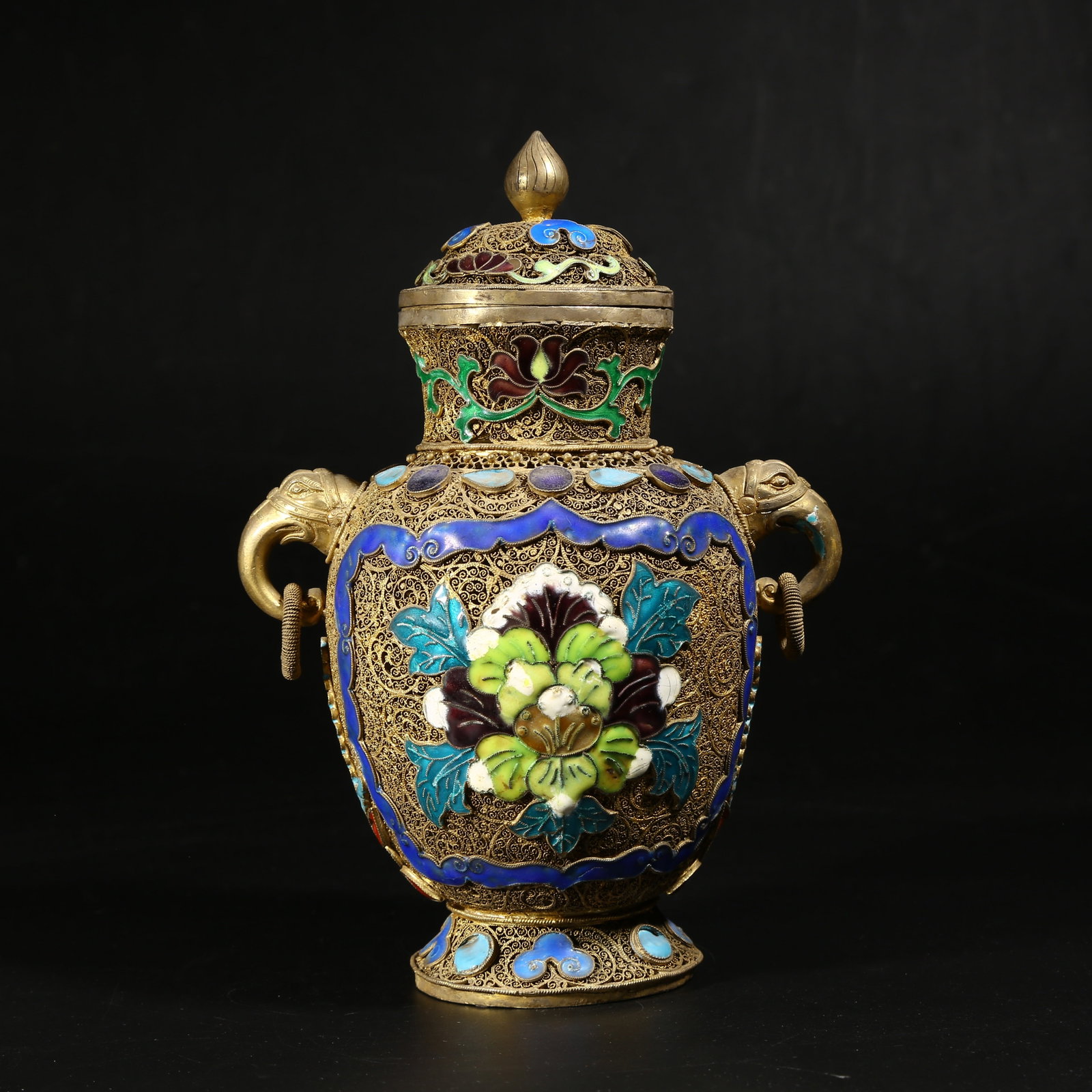 A GILDED SILVER FILIGREE CLOISONNÉ VASE WITH FLORAL DESIGN, RINGS, AND ELEPHANT-EAR HANDLES: Gilded silver filigree cloisonne vase with floral design, rings, and elephant-ear handles