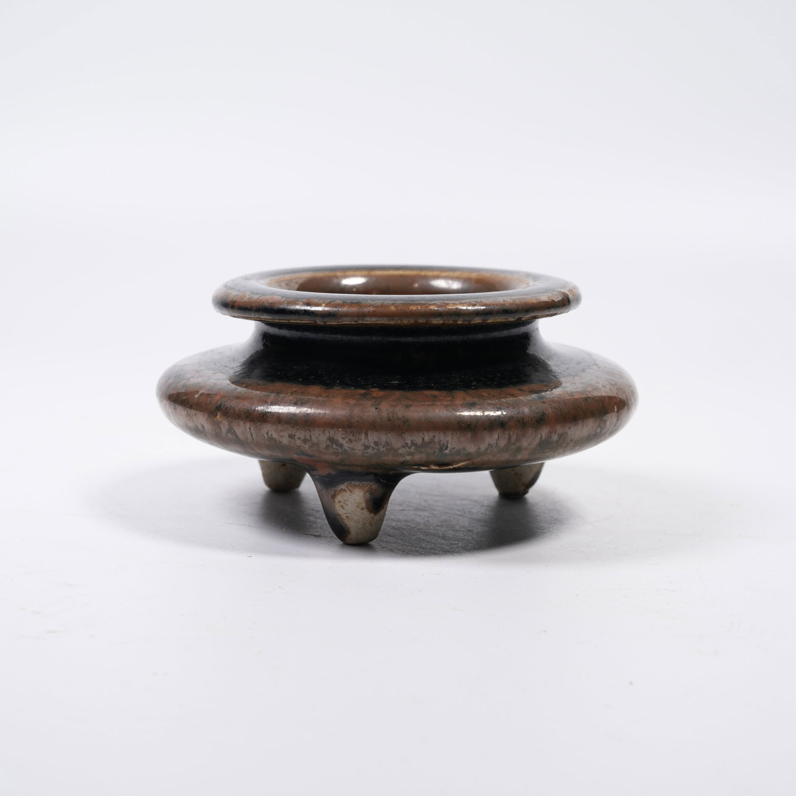 A CIZHOUYAO TRIPOD CENSER: Cizhouyao Tripod Censer