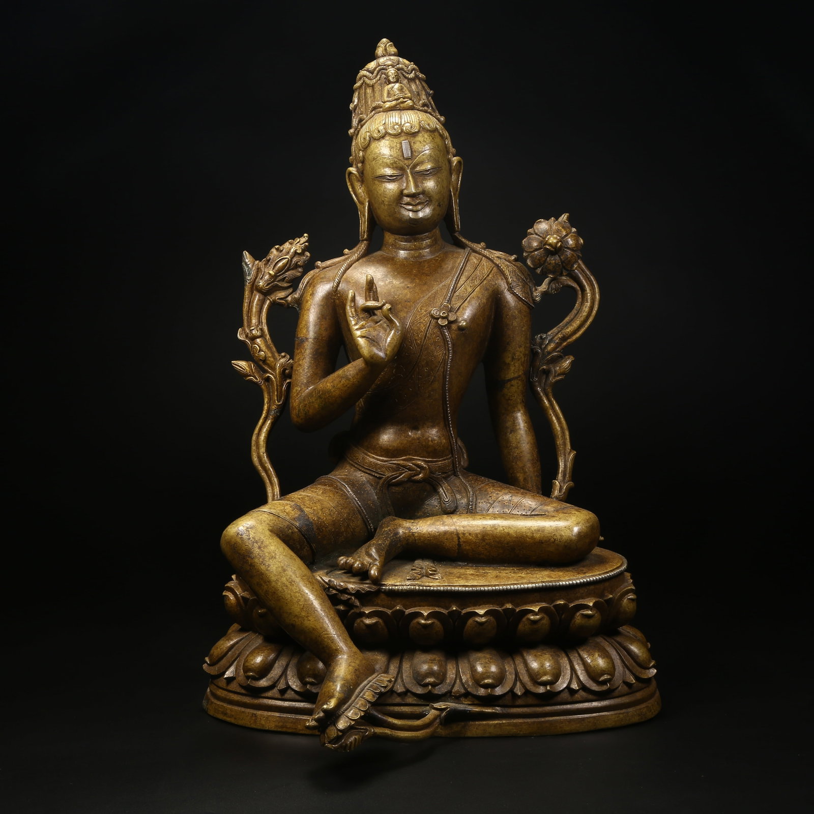 A ALLOYED COPPER STATUE OF FREE AND EASY AVALOKITESHVARA: Alloyed copper statue of Free and Easy Avalokiteshvara