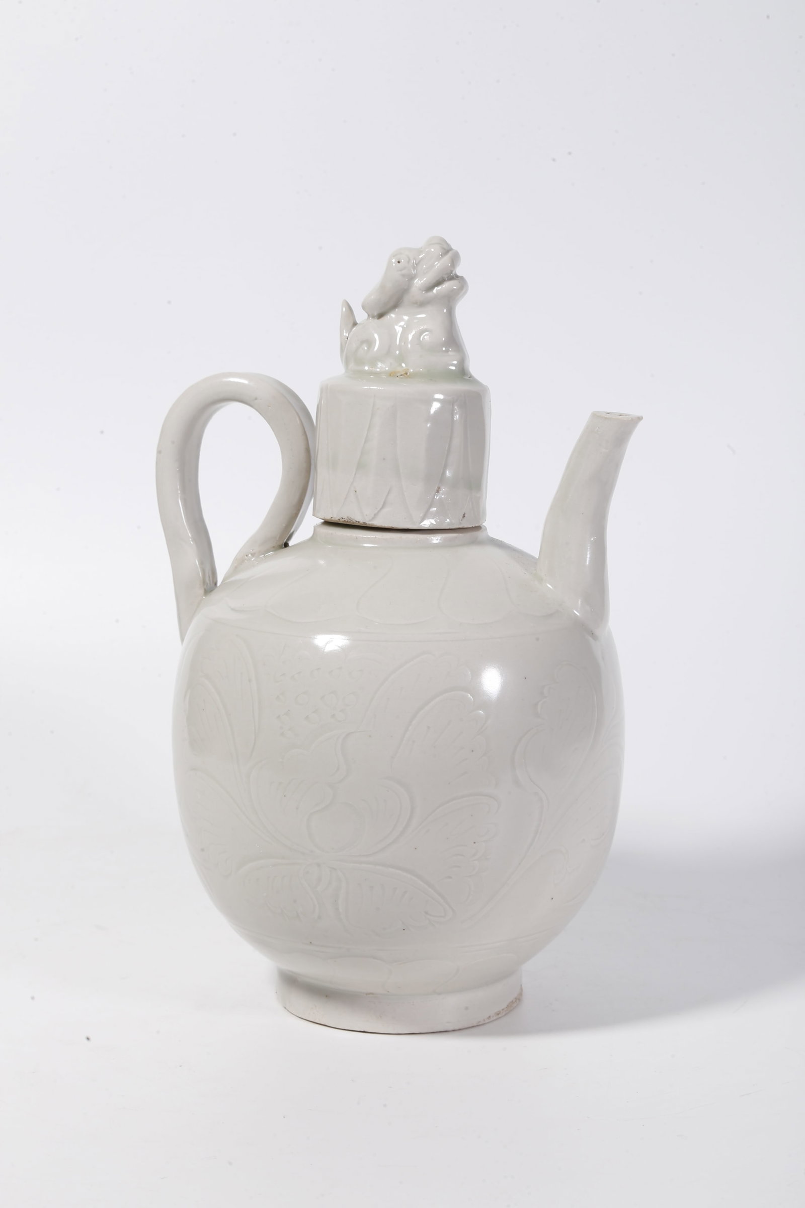 A WHITE GLAZE BEAST-KNOBBED WINE WARMER (1 of 9)
