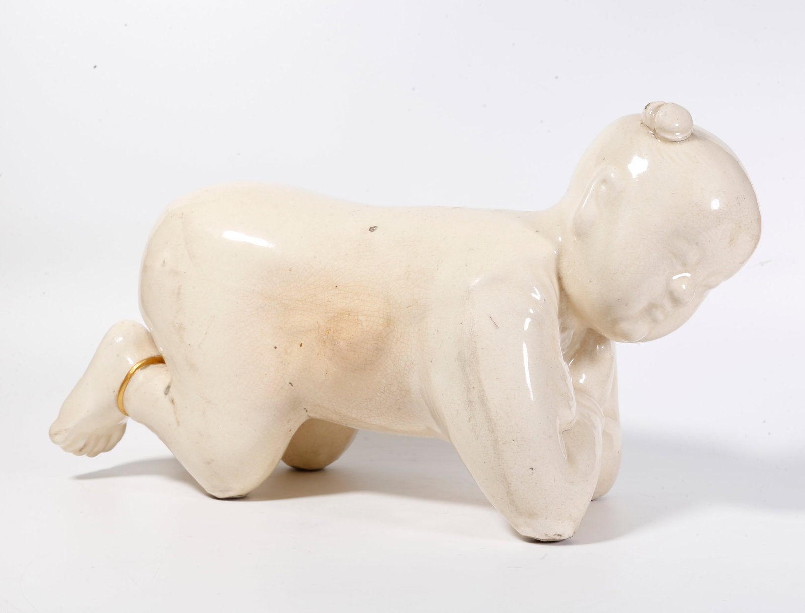A WHITE GLAZE CHILD PILLOW (1 of 10)