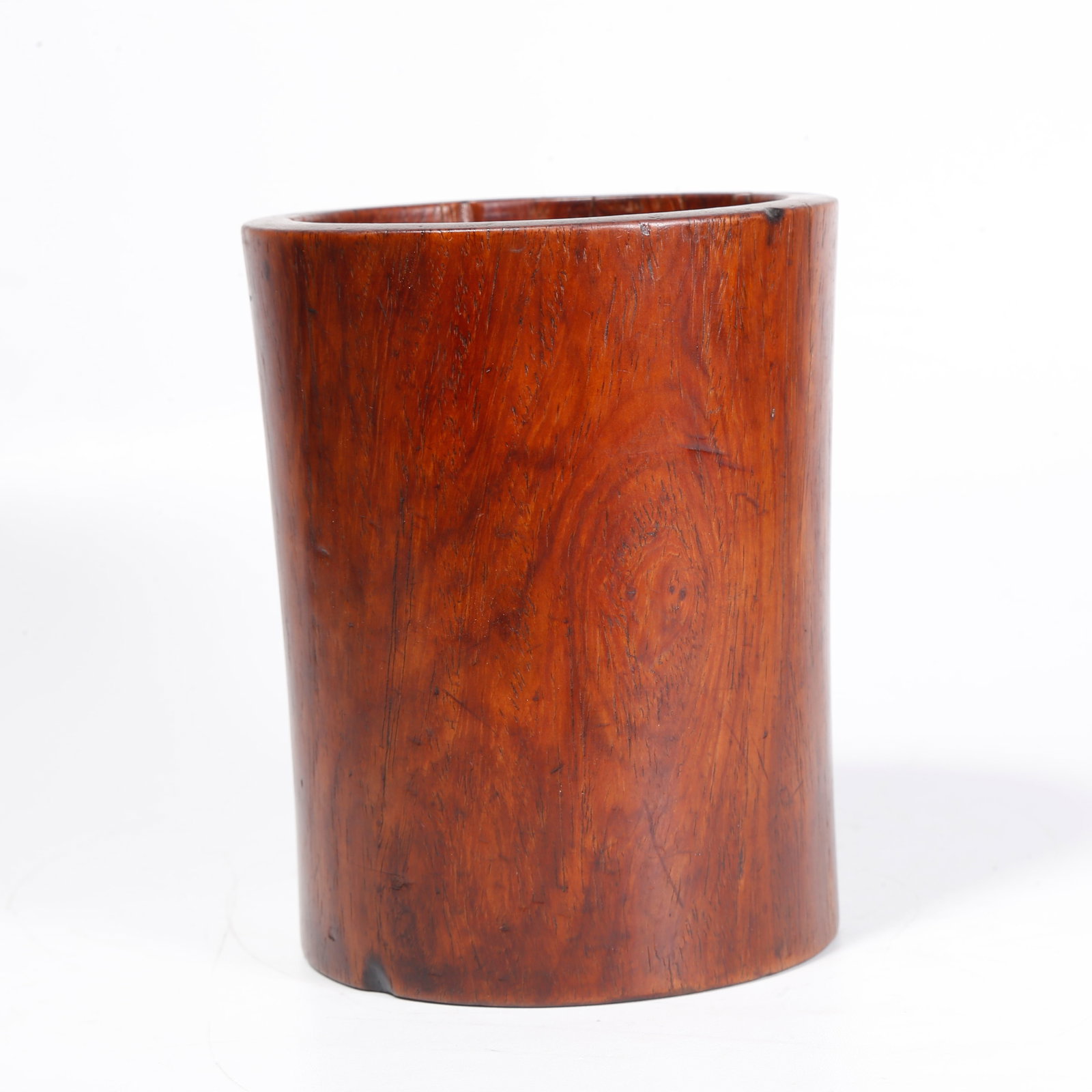 A HUANGHUALI CARVED BRUSH POT: Huanghuali Carved Brush Pot
