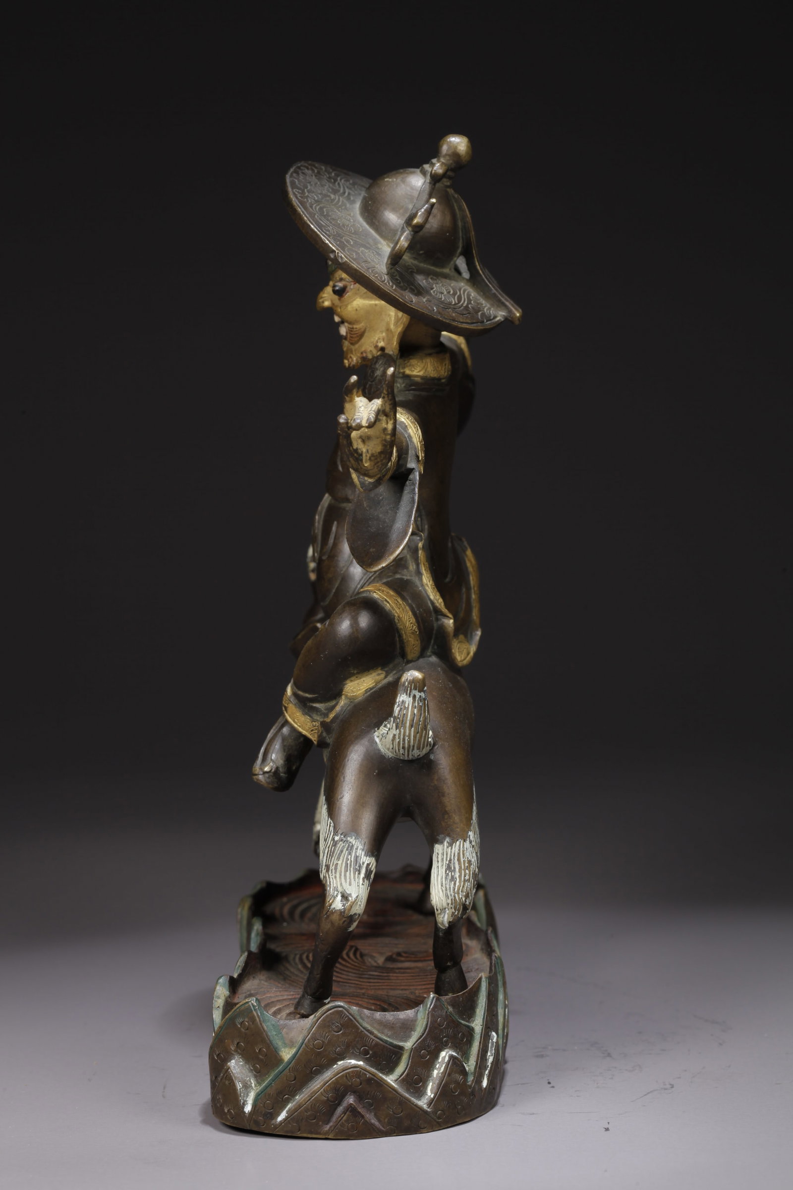 A GILDED BRONZE PROTECTOR DEITY STATUE - 4