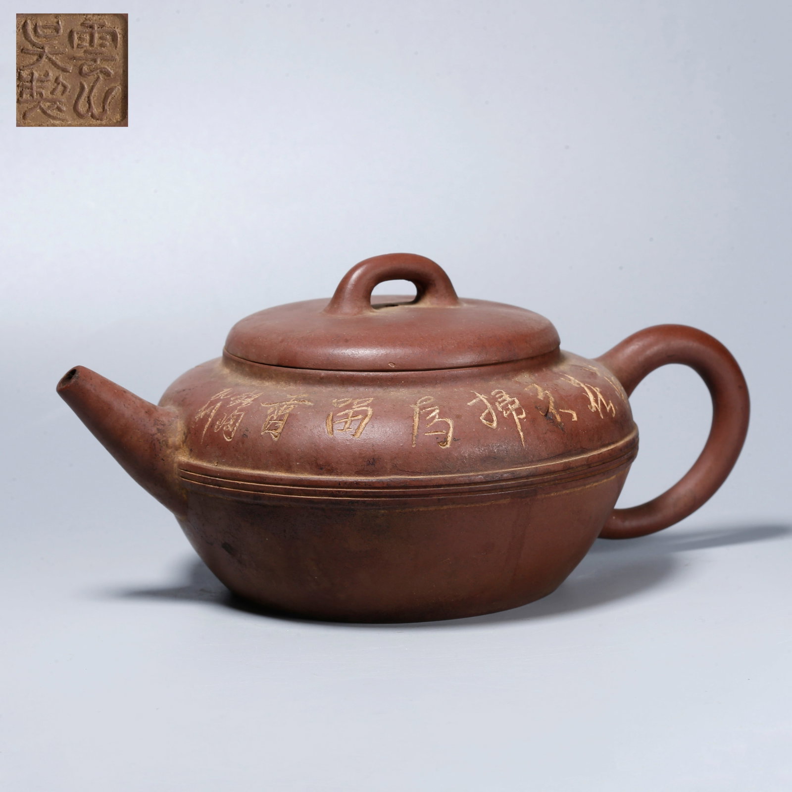 A ZISHA EWER WITH CARVED PLUM BLOSSOM DESIGN: Zisha Ewer with Carved Plum Blossom Design