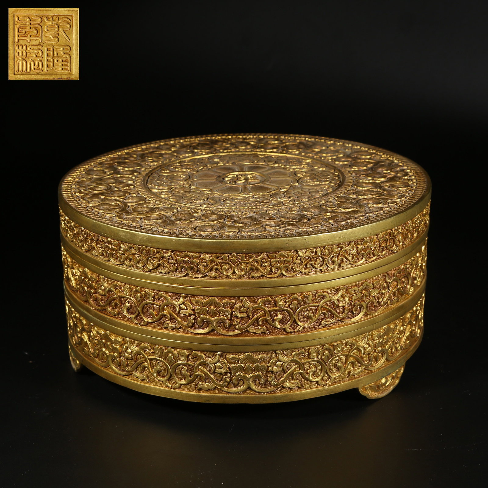 A GILT BRONZE COVERED BOX WITH FLORAL DESIGN: Gilt Bronze Covered Box with Floral Design