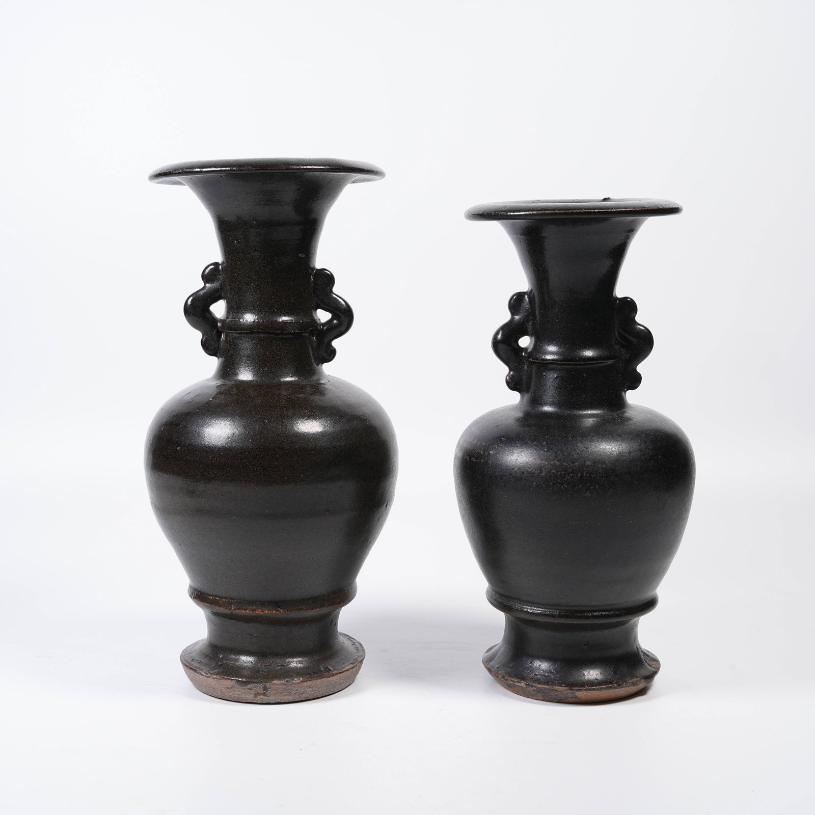 A SET OF BROWN GLAZE TWO-EARED MOUTH VASES (1 of 11)