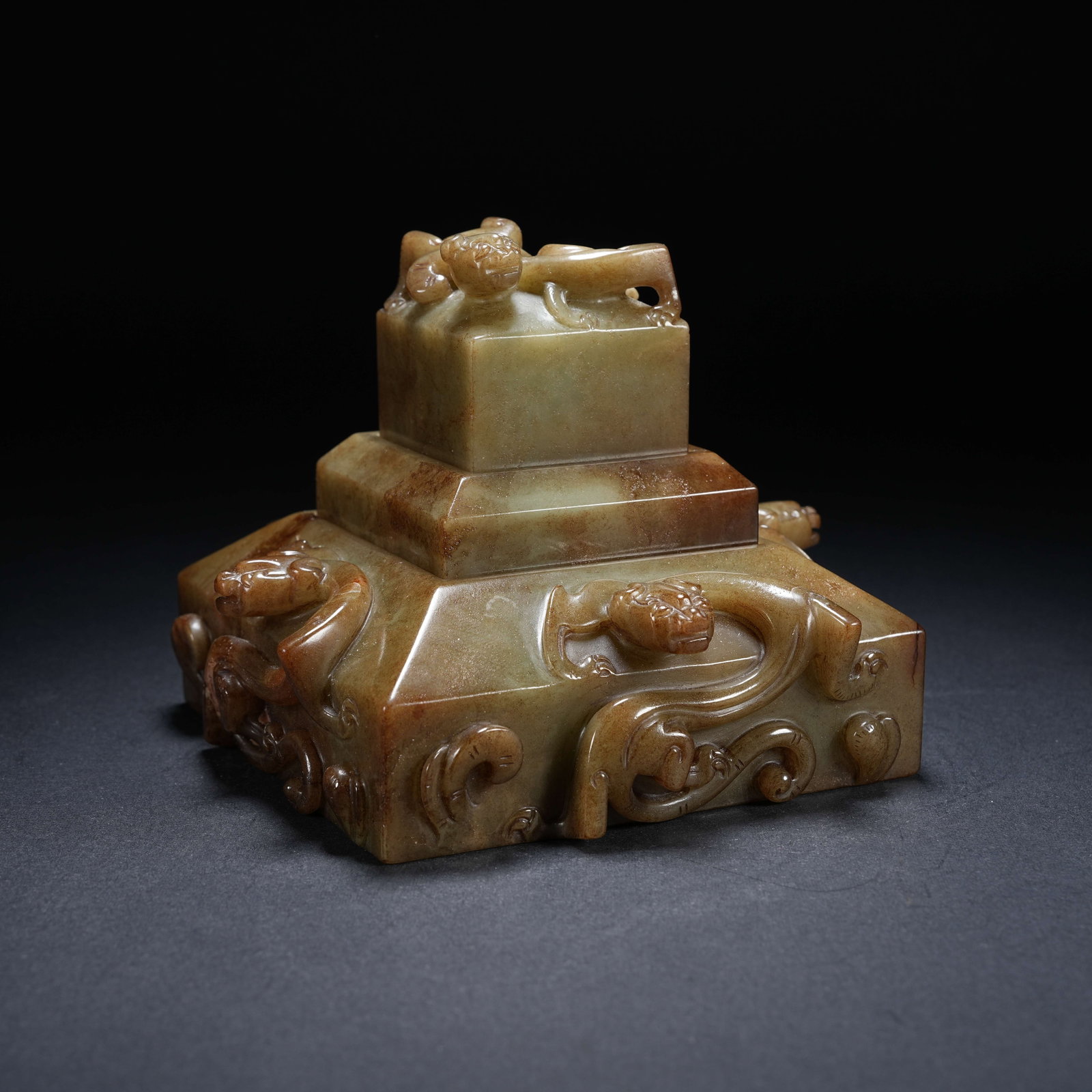 A ARCHAIC JADE TRIPLE-COMBINED DRAGON KNOB SEAL: Archaic Jade Triple-Combined Dragon knob Seal