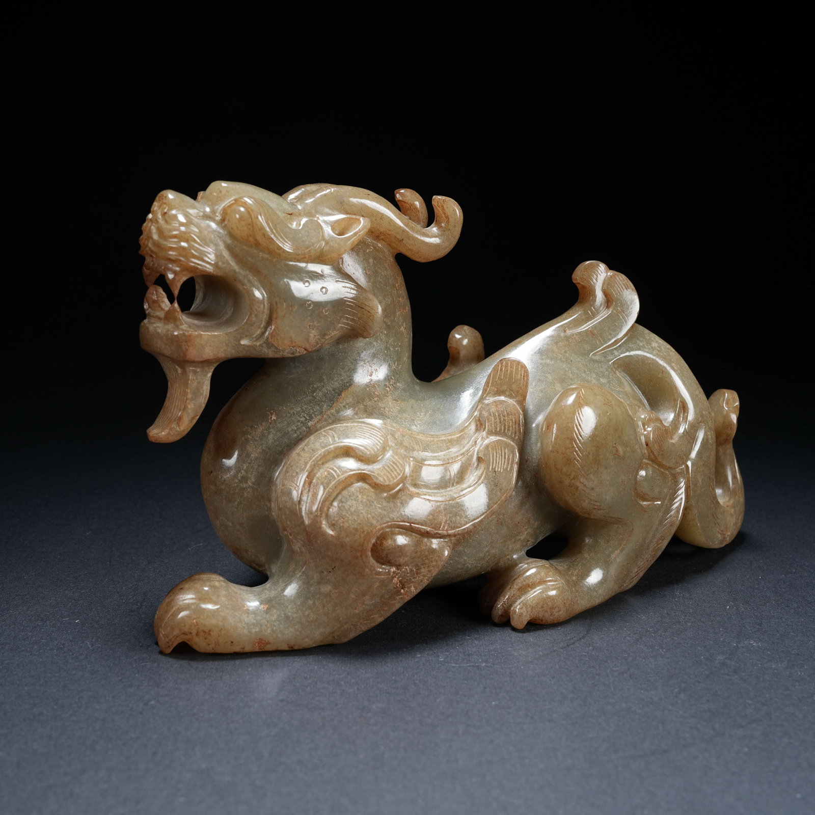 A ANCIENT JADE AUSPICIOUS BEAST ORNAMENT: Ancient Jade Auspicious Beast Ornament