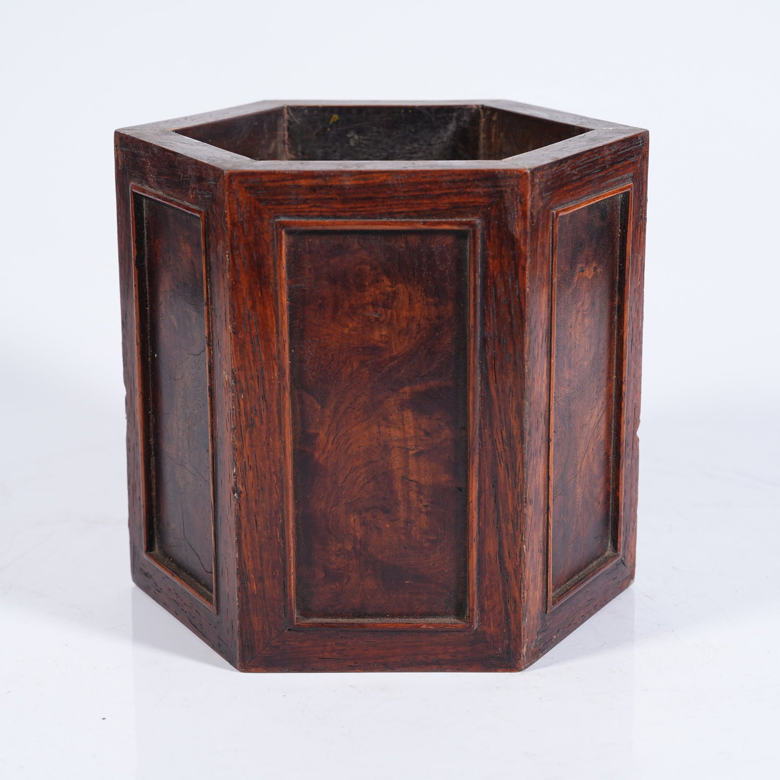 A HEXAGONAL HUANGHUALI WOOD BRUSH POT: Hexagonal Huanghuali Wood Brush Pot