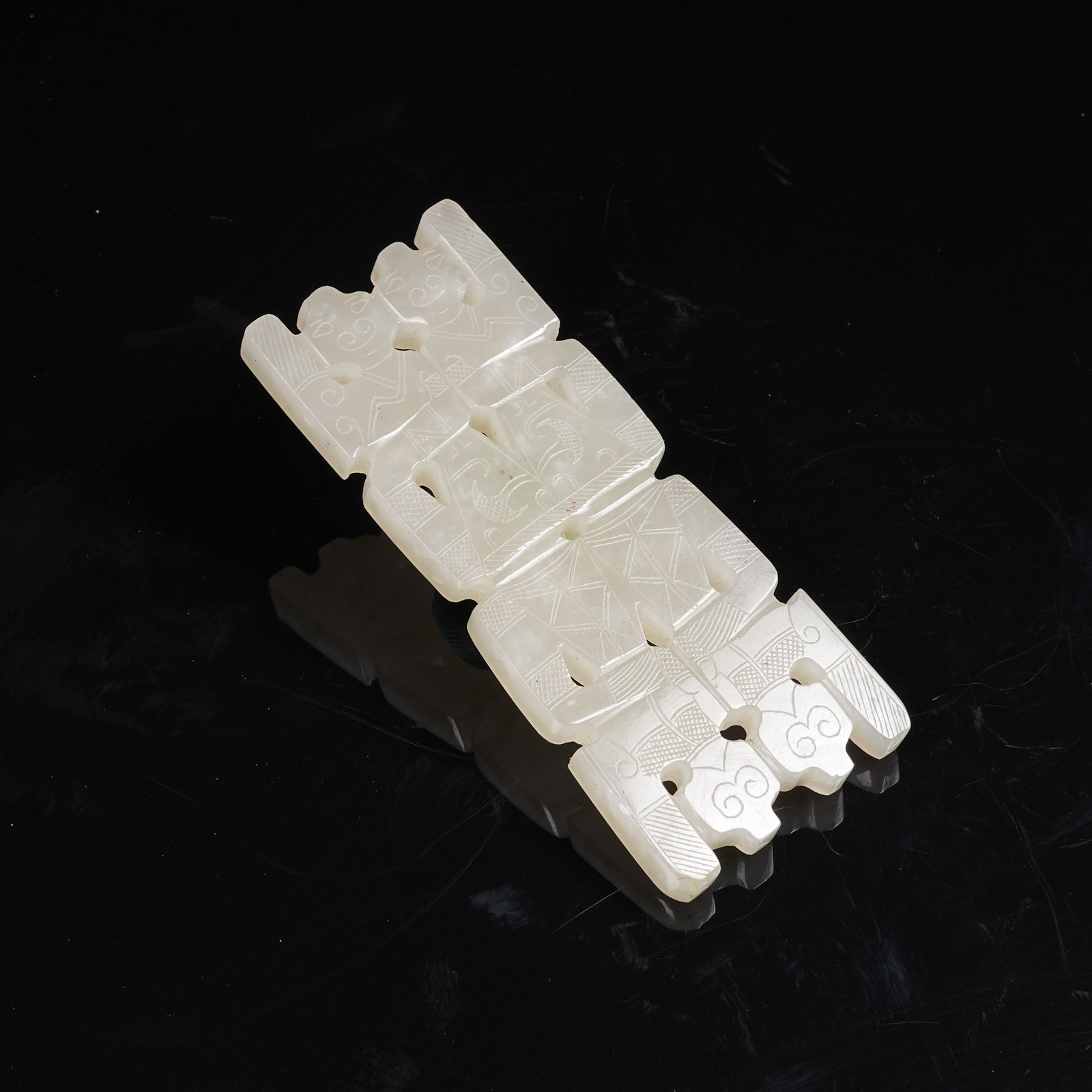 A NEPHRITE DANCER PENDANT (1 of 9)