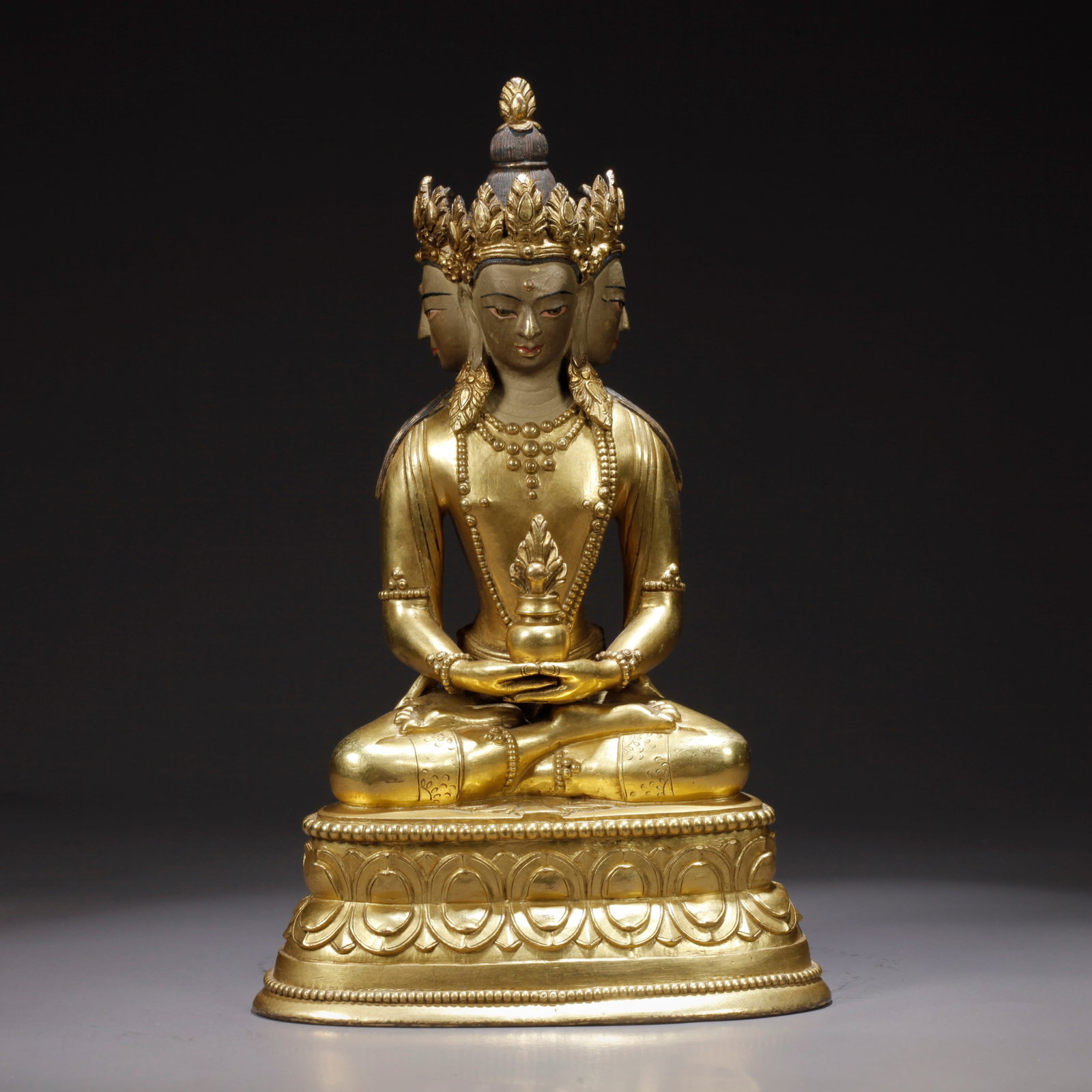A GILDED BRONZE MEDICINE BUDDHA STATUE (1 of 9)