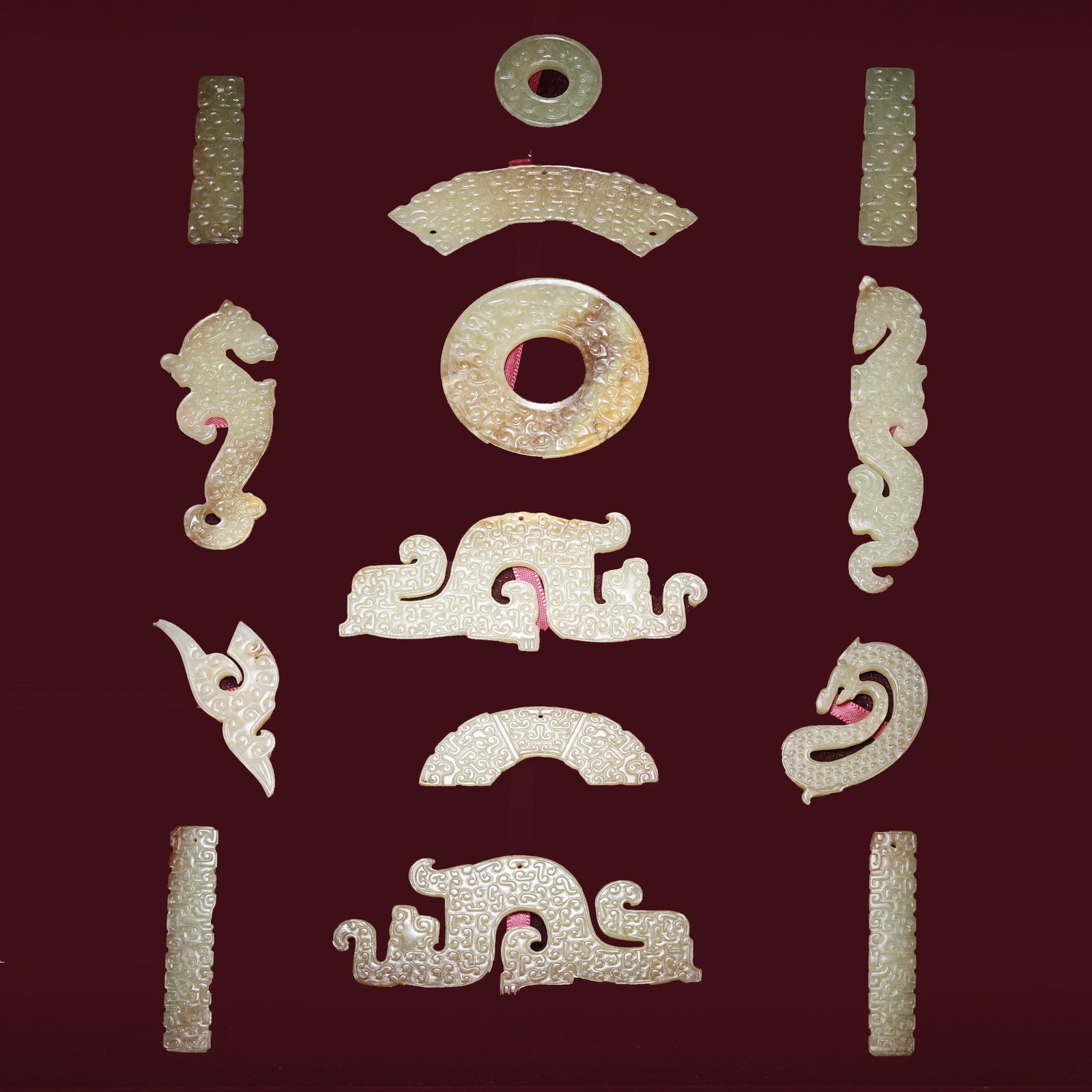 A ANCIENT JADE PENDANT SETS: Ancient Jade Pendant Sets