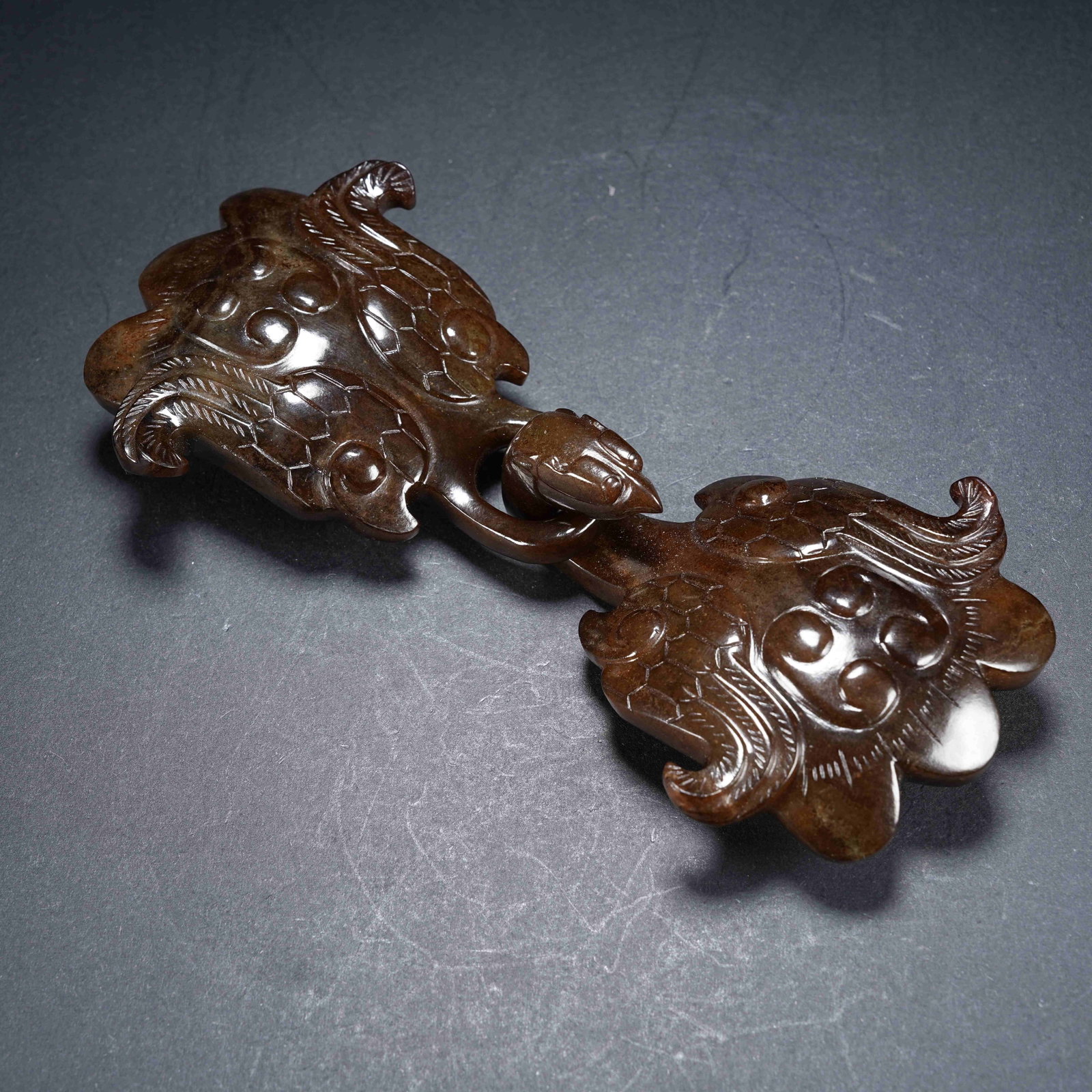 A SET OF ARCHAIC JADE PHOENIX PATTERN BELT BUCKLES: Set of Archaic Jade Phoenix Pattern Belt Buckles