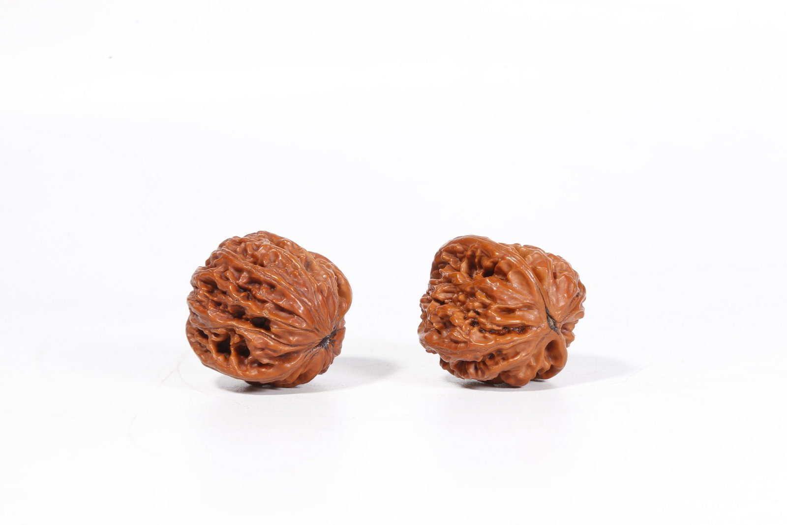 A WALNUT ORNAMENTS (PAIR) - 6