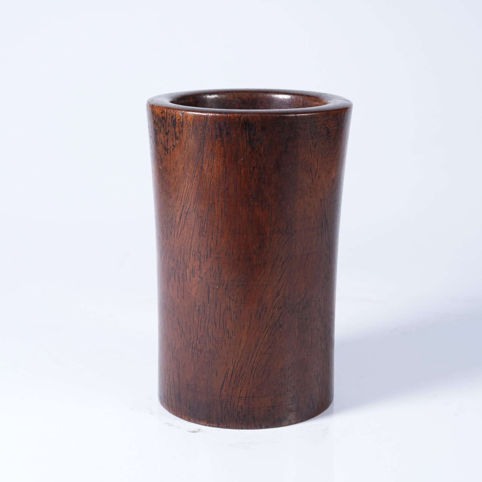 A MINI HUANGHUALI WOOD HANDHELD ORNAMENT: Mini Huanghuali Wood Handheld Ornament
