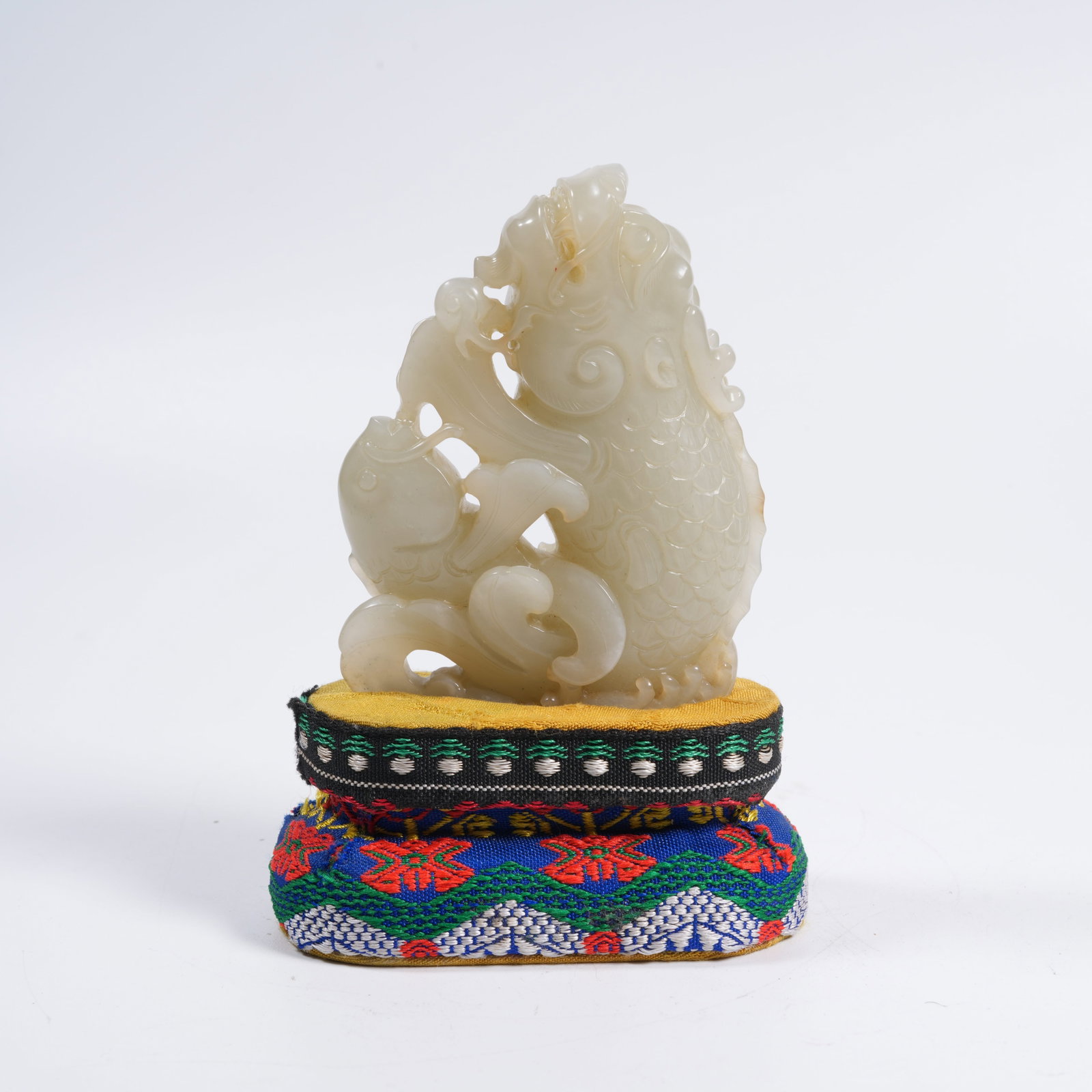A HETIAN JADE DRAGON TRANSFORMING FROM FISH ORNAMENT: Hetian Jade Dragon Transforming from Fish Ornament