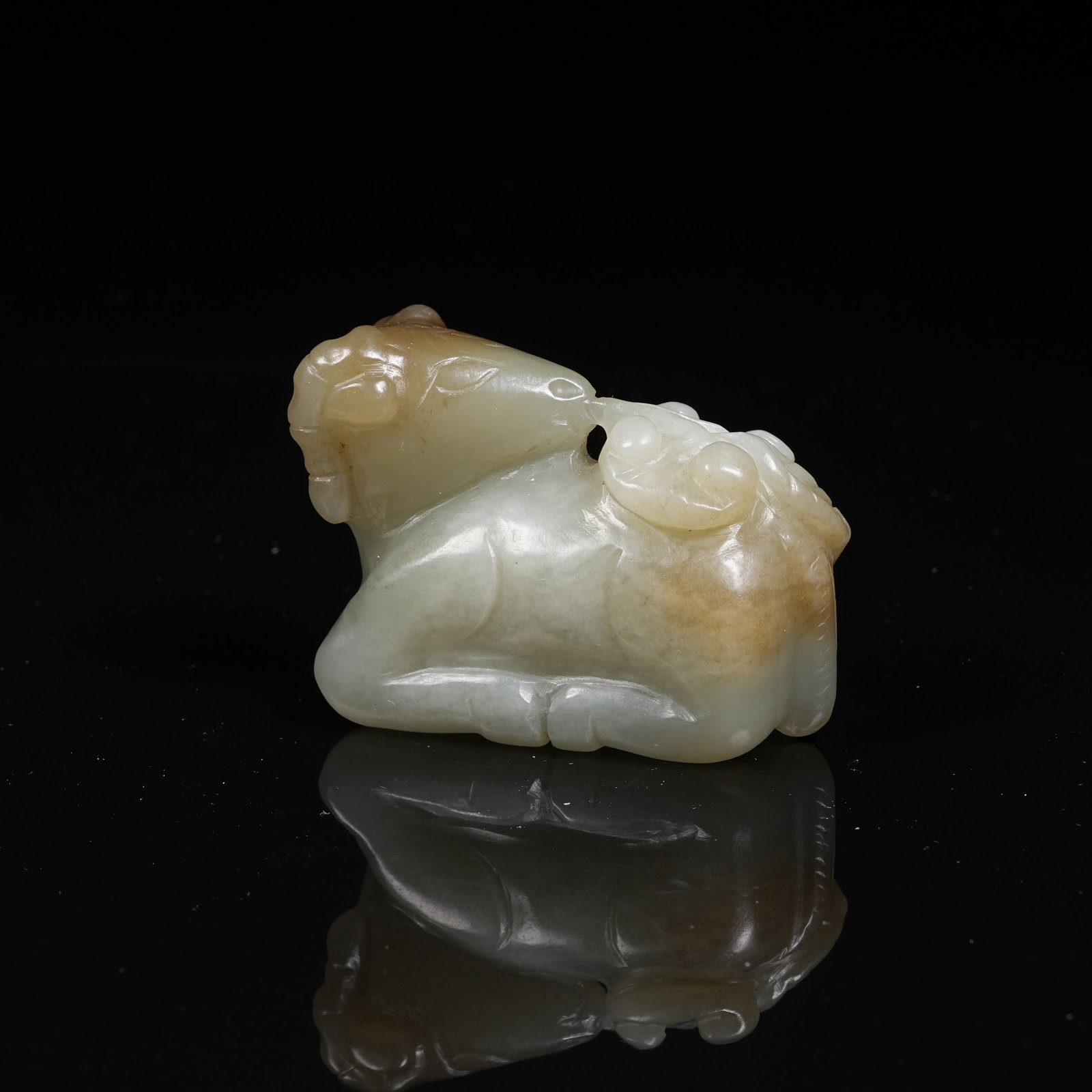 A ARCHAIC JADE ORNAMENT OF DEER HOLDING GANODERMA (1 of 8)