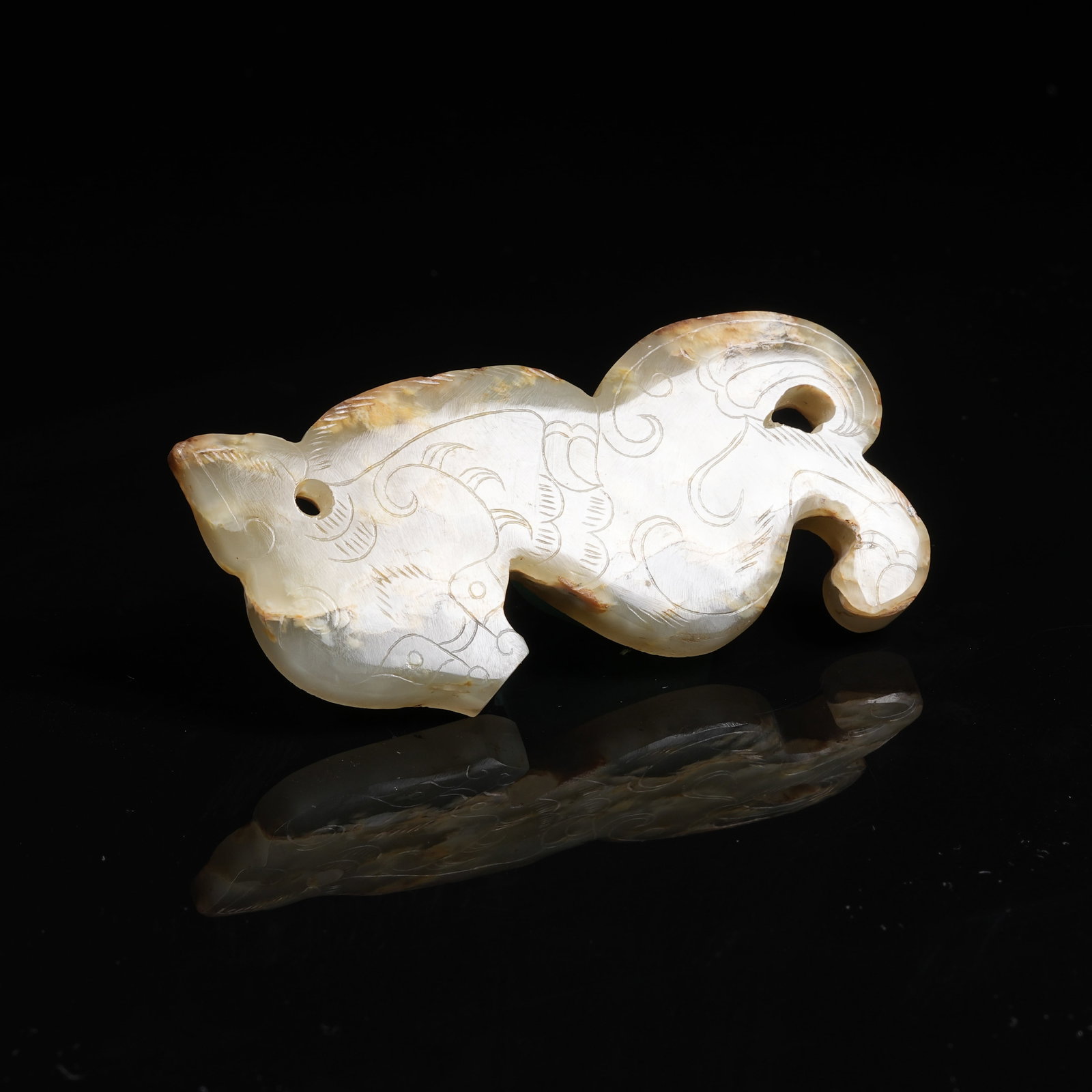 A ARCHAIC JADE PENDANT WITH INCISED AUSPICIOUS BEAST (1 of 8)
