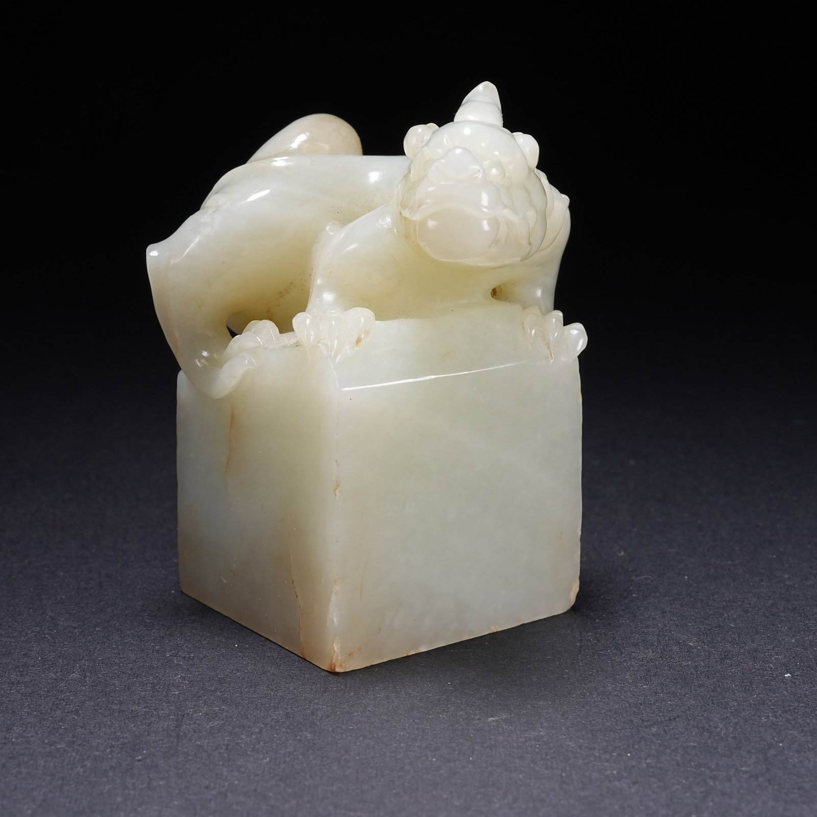 A HETIAN JADE BEAST BUTTON SEAL: Hetian Jade Beast Button Seal