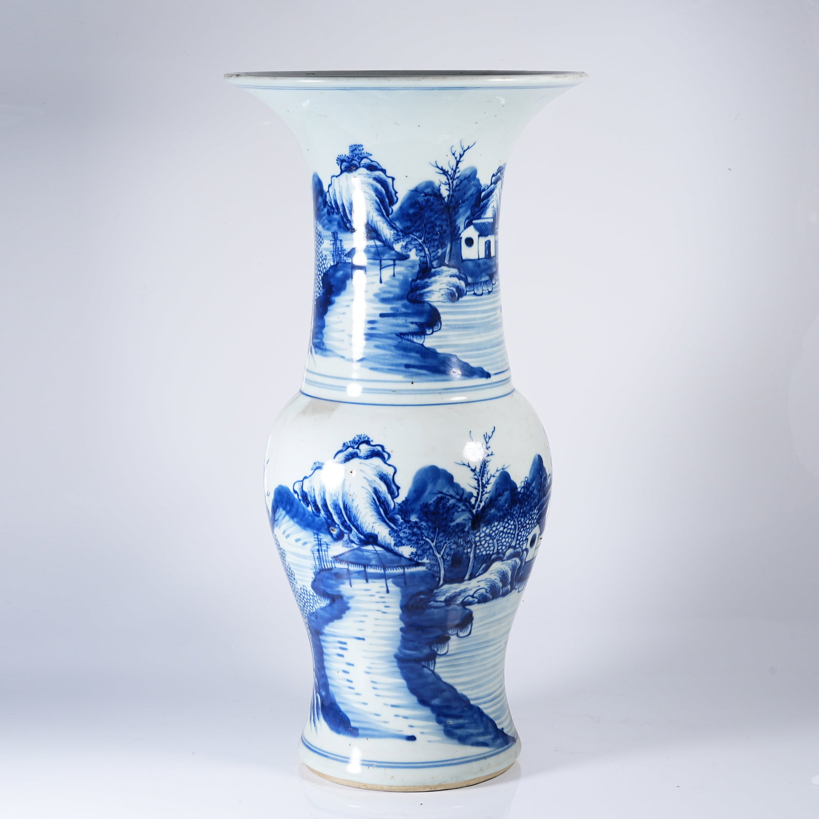A BLUE AND WHITE PHOENIX-TAIL ZUN VASE WITH LANDSCAPE AND PAVILION PATTERN: Blue and White Phoenix-tail Zun Vase with Landscape and Pavilion Pattern
