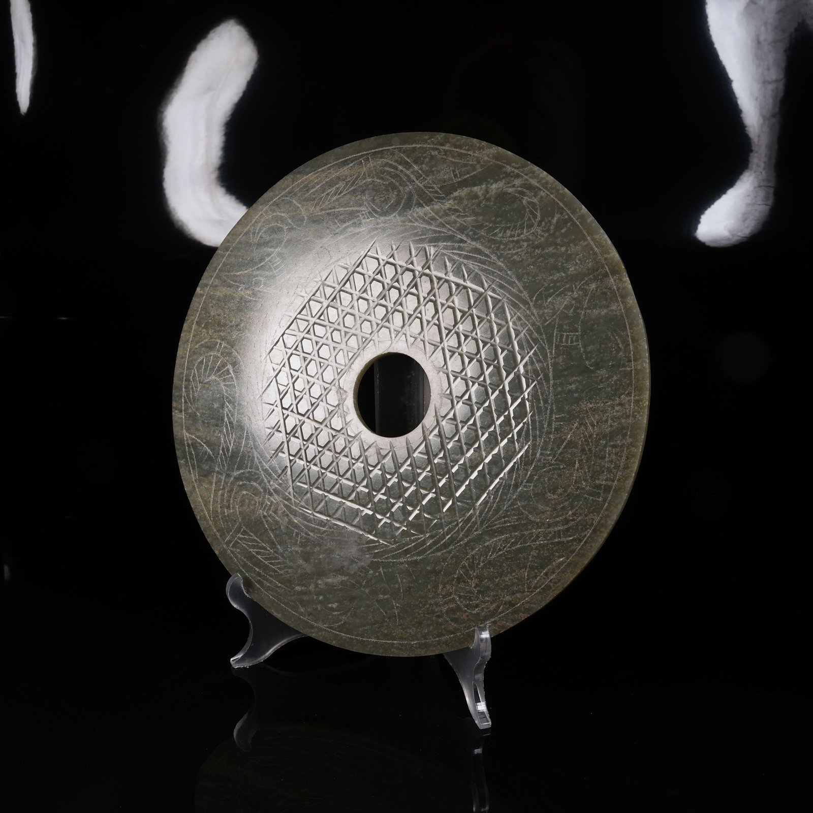 A ARCHAIC JADE BI DISC WITH DRAGON AND PHOENIX PATTERN (1 of 9)