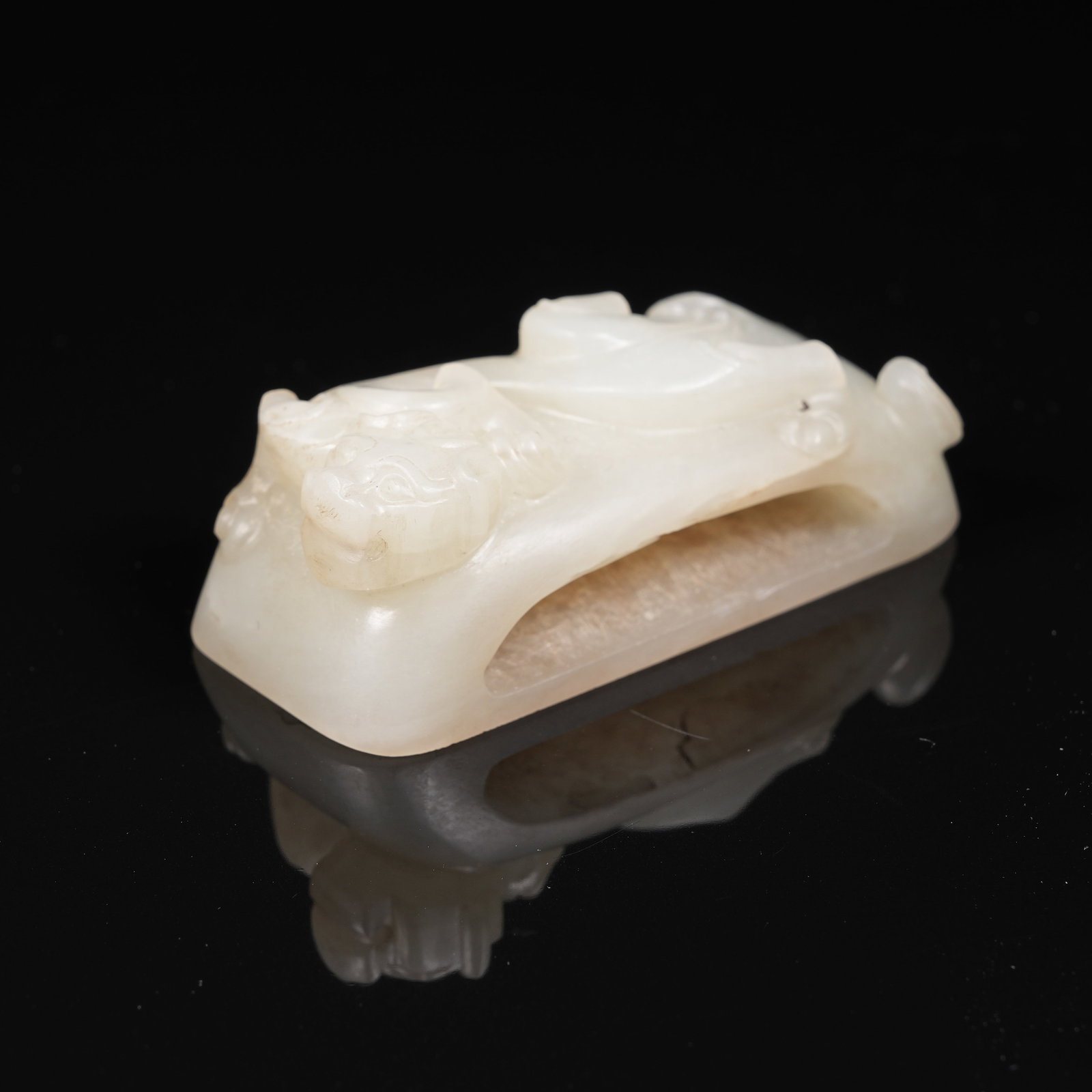 A NEPHRITE SWORD GUARD WITH CHI DRAGON PATTERN: Nephrite Sword Guard with Chi Dragon Pattern