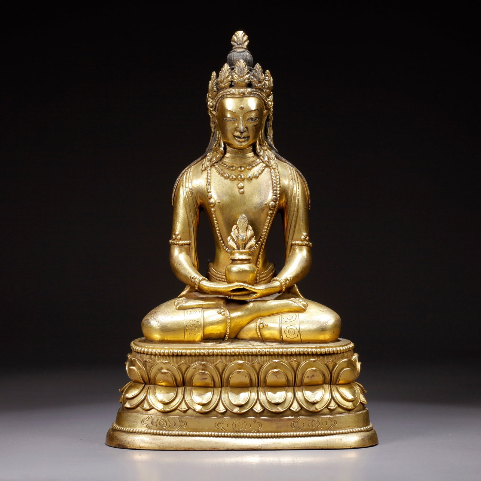 A GILDED BRONZE MEDICINE BUDDHA STATUE (1 of 9)