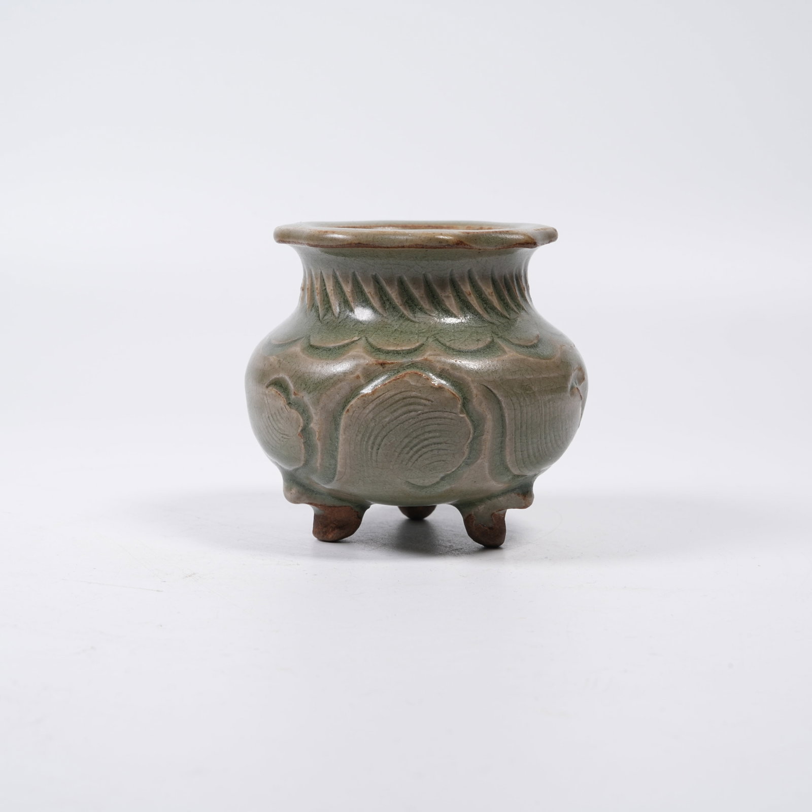 A YUEYAO SMALL TRIPOD CENSER WITH INCISED PATTERNS: Yueyao Small Tripod Censer with Incised Patterns