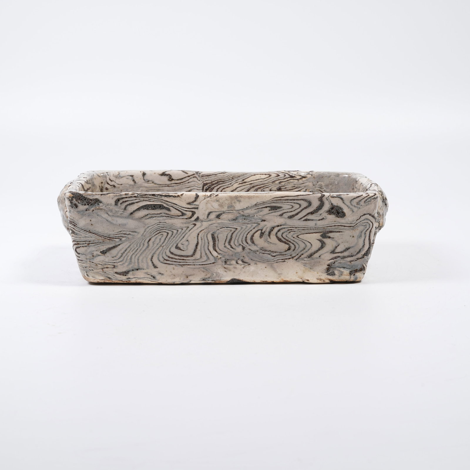 A MARBLED CLAY BRUSH WASHER WITH BEAST-MASK HANDLES (1 of 9)