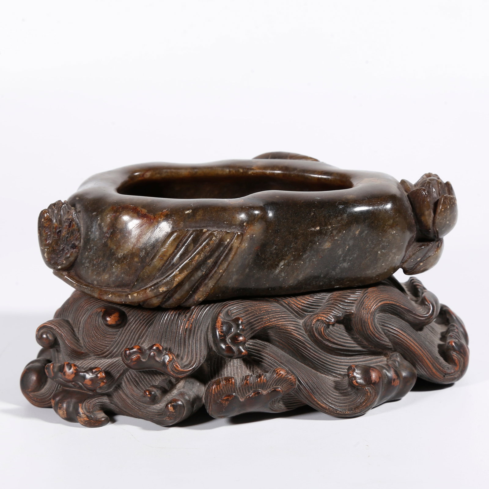 A STONE WASHER WITH LOTUS PATTERN: Stone Washer with Lotus Pattern