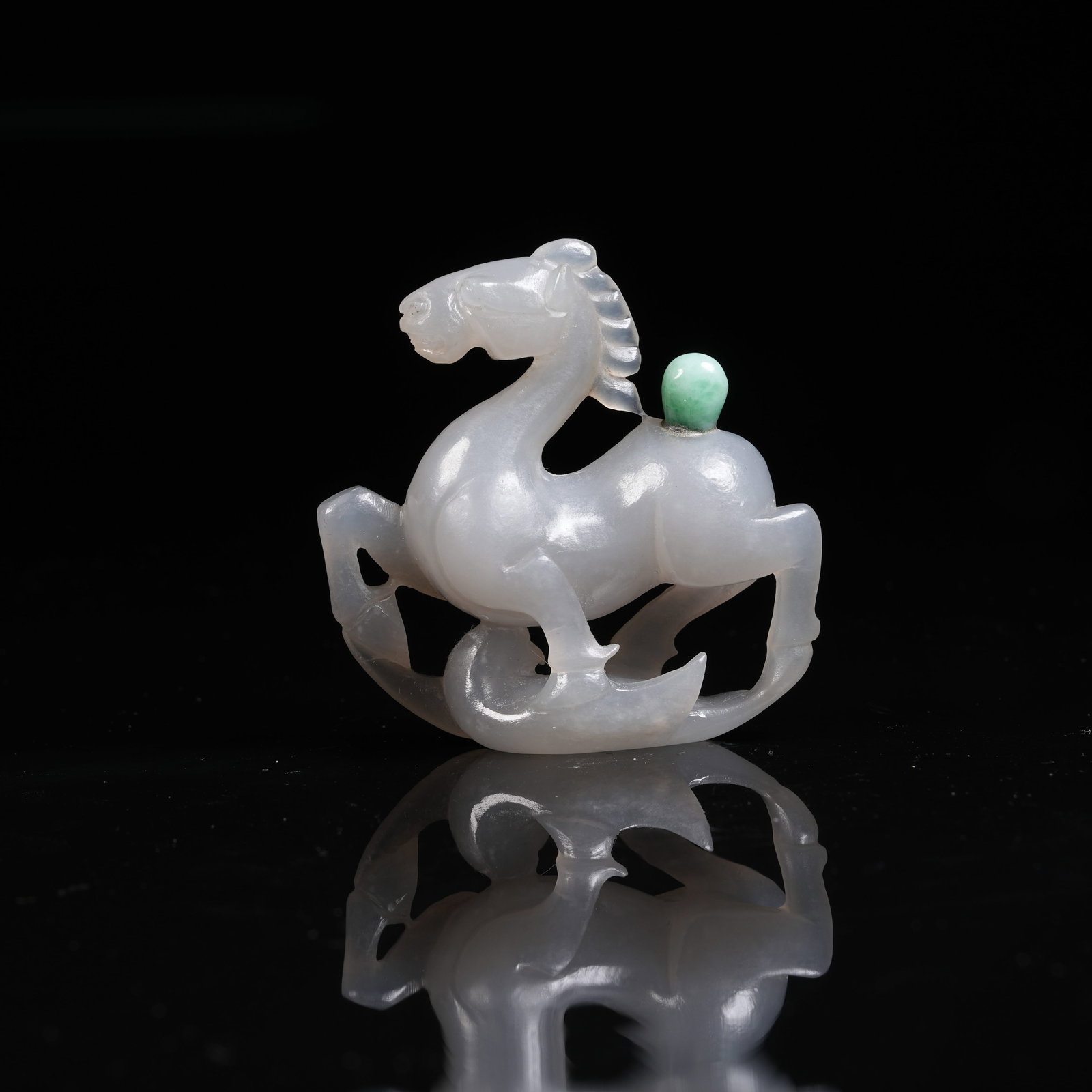 A NEPHRITE ORNAMENT OF HORSE STEPPING ON SWALLOW: Nephrite Ornament of Horse Stepping on Swallow
