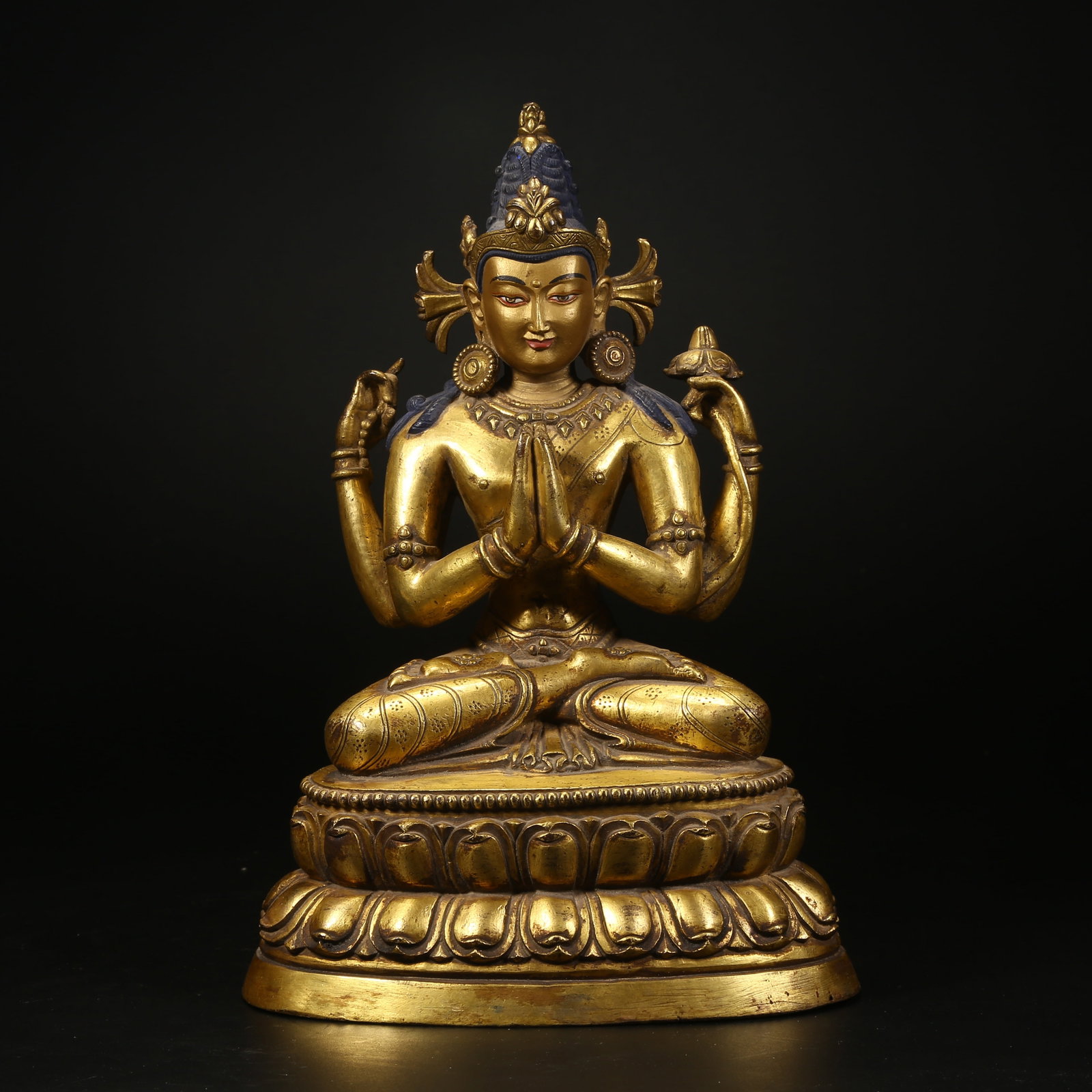 A GILT BRONZE STATUE OF FOUR-ARMED AVALOKITESHVARA: Gilt bronze statue of Four-Armed Avalokiteshvara
