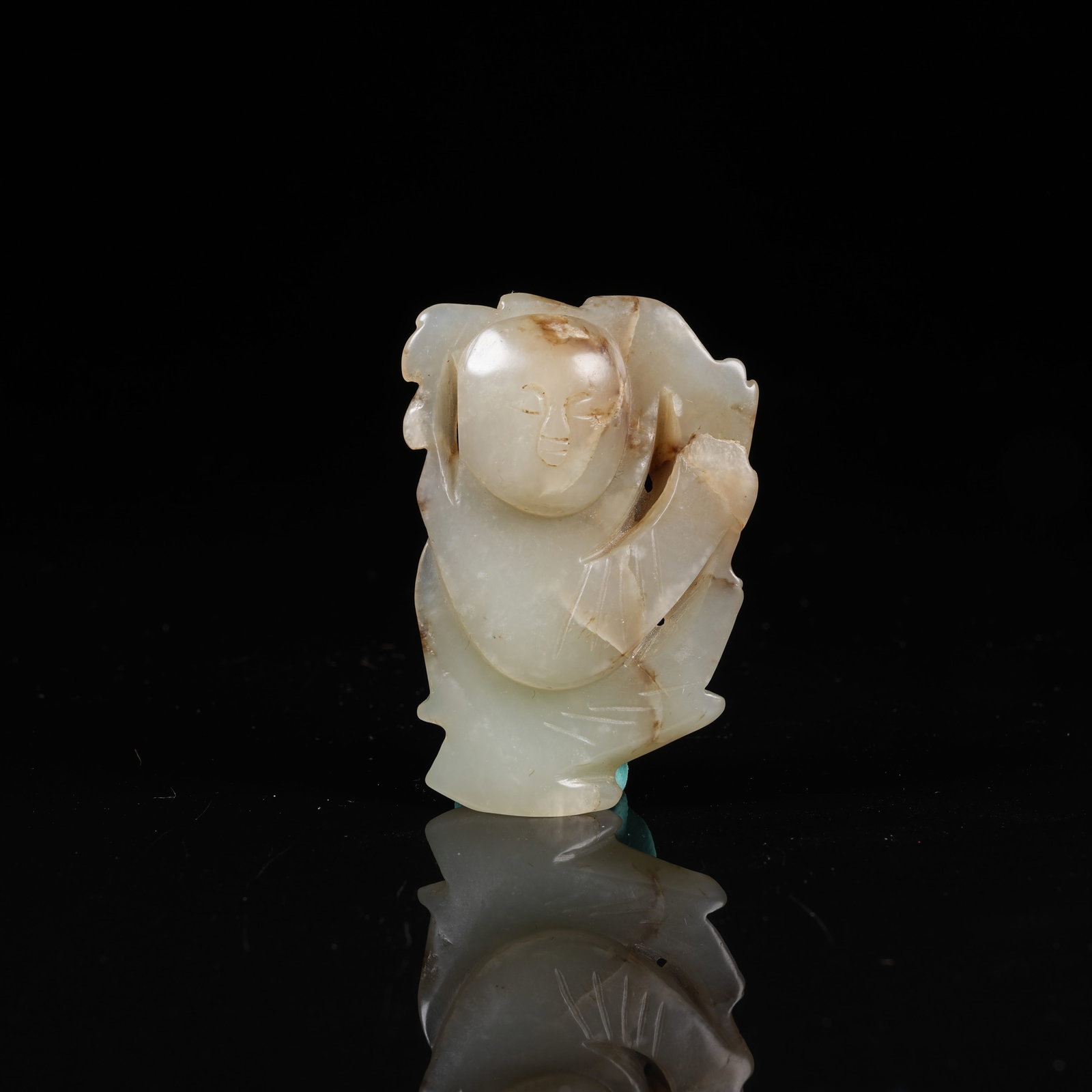 A MID-ANCIENT JADE DANCER PENDANT: Mid-Ancient Jade Dancer Pendant