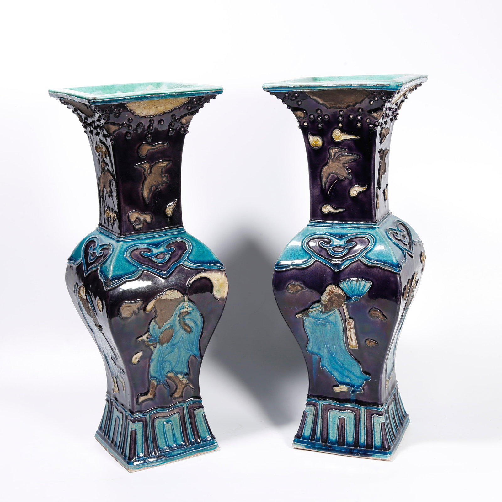 A FAHUA GLAZED GU VASE WITH EIGHT IMMORTALS PATTERN (PAIR): Fahua Glazed Gu Vase with Eight Immortals Pattern (Pair)