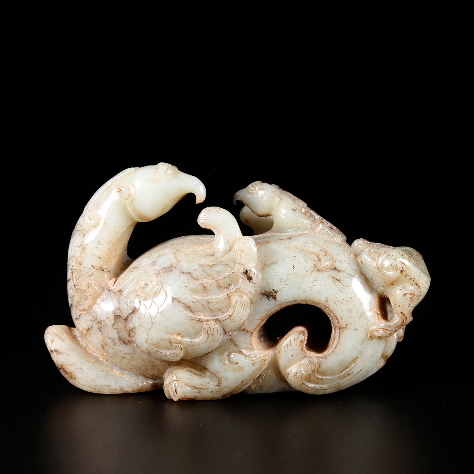 A HETIAN JADE BEAST ORNAMENT: Hetian Jade Beast Ornament