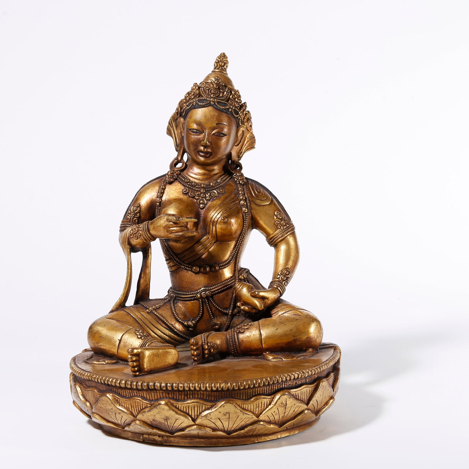 A GILT BRONZE STATUE OF VASUDHARA: Gilt Bronze Statue of Vasudhara