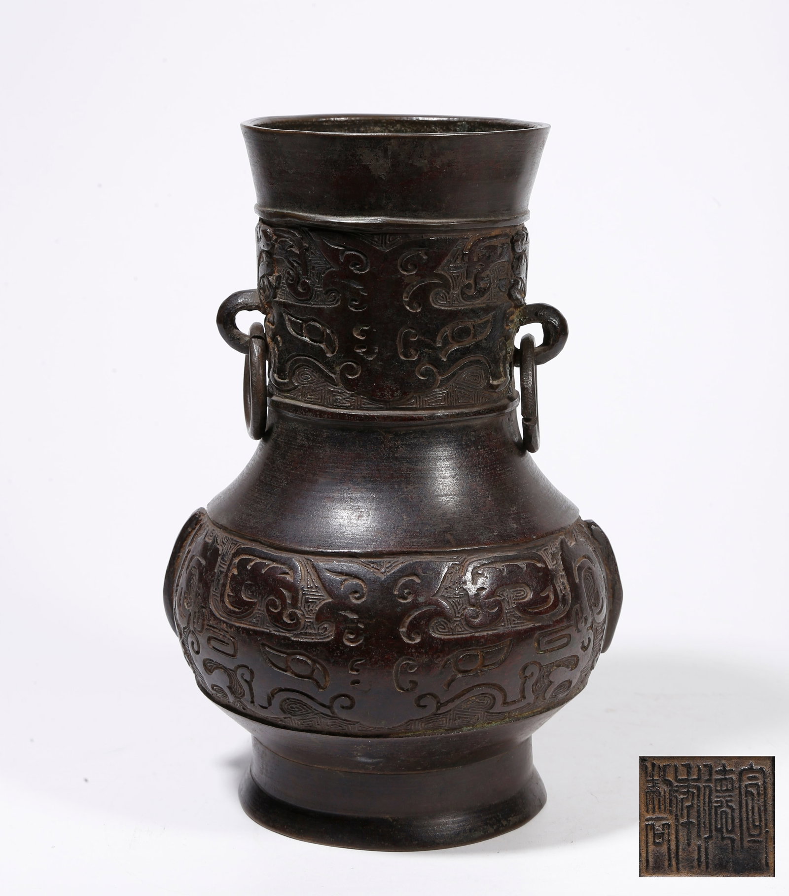 A BRONZE VASE WITH BEAST MASK PATTERNS: Bronze Vase with Beast Mask Patterns