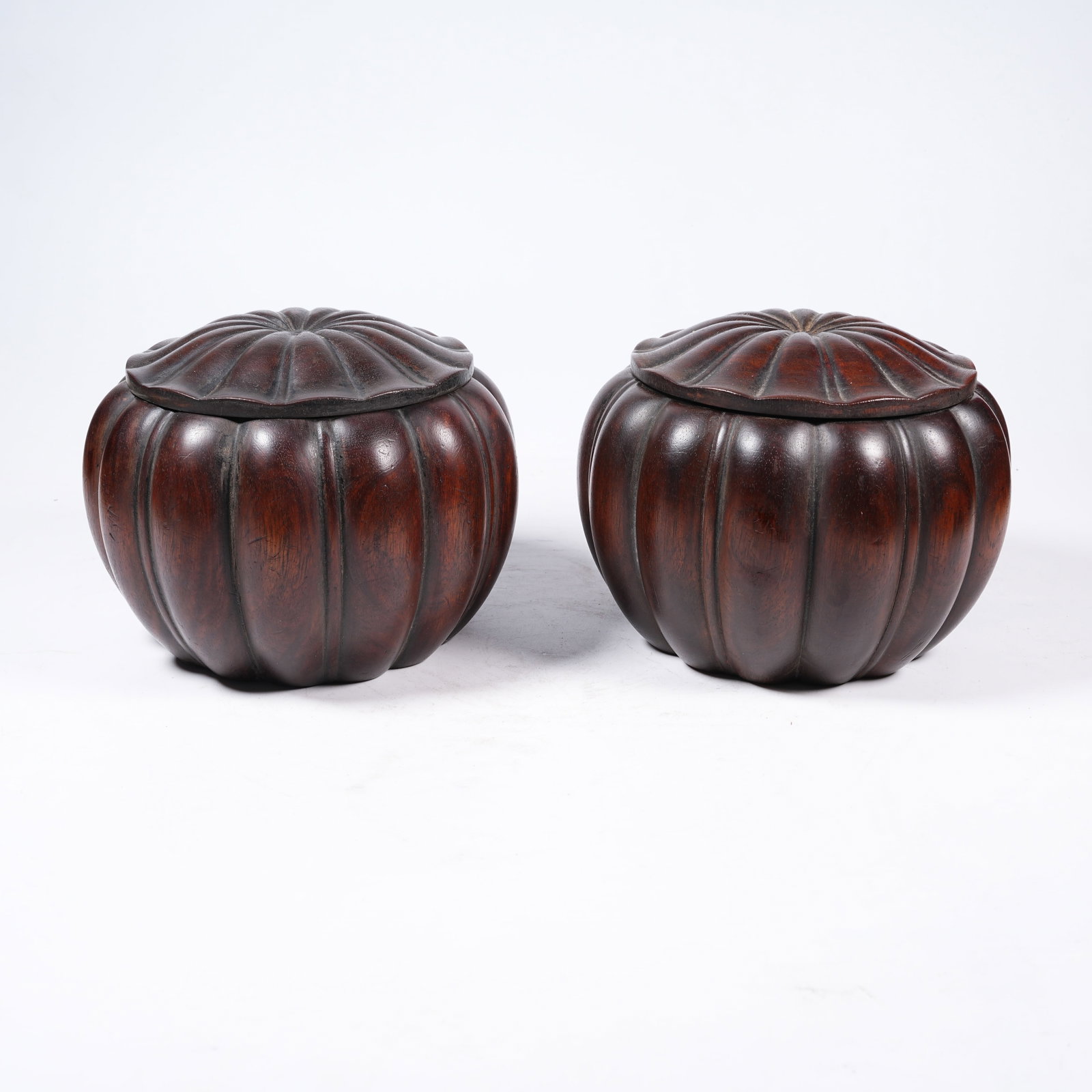 A SET OF ZITAN WOOD MELON-SHAPED GO JARS: Set of Zitan Wood Melon-shaped Go Jars