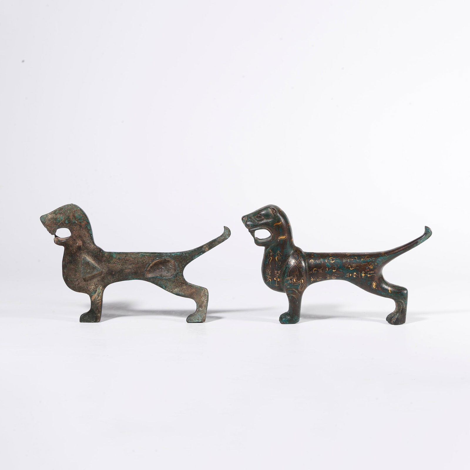 A BRONZE TIGER TALISMAN WITH GOLD INLAY (1 of 10)