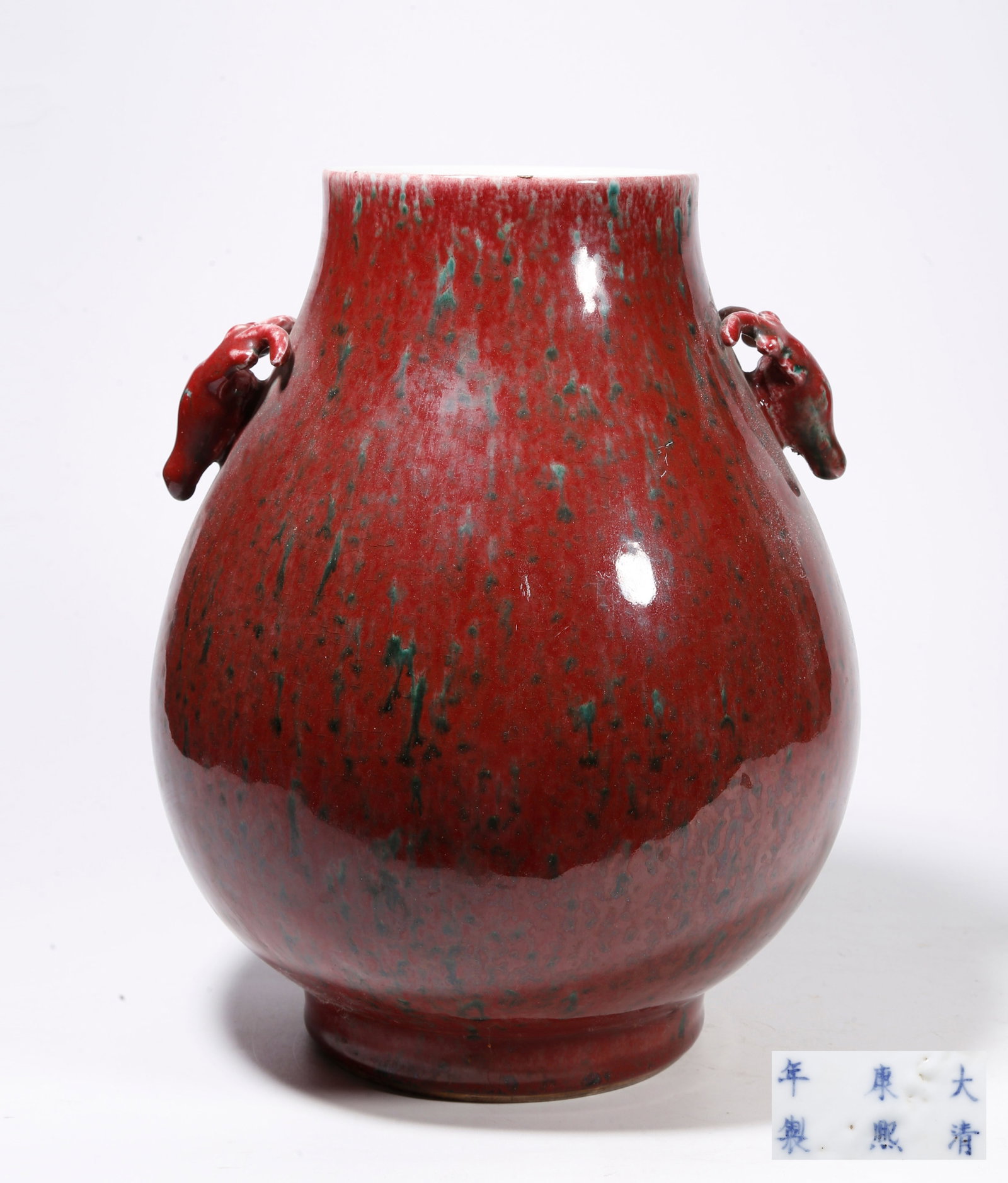 A BEAN RED GLAZE DEER-HEAD ZUN VESSEL: Bean Red Glaze Deer-head Zun Vessel
