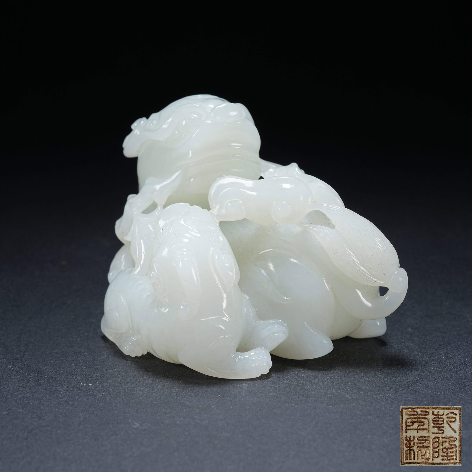 A HETIAN JADE MOTHER AND CUB BEAST ORNAMENT: Hetian Jade Mother and Cub Beast Ornament