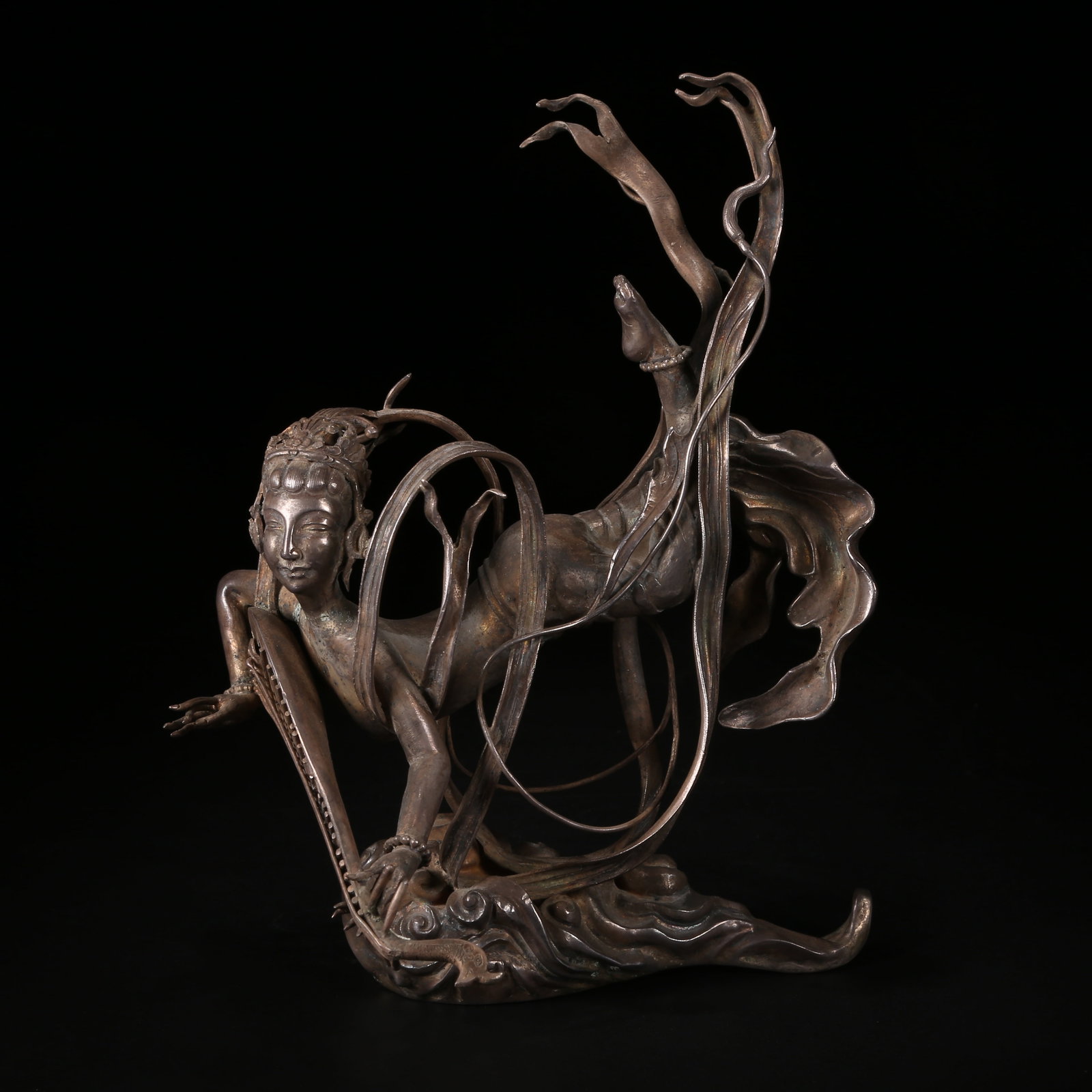 A SILVER FLYING APSARA: Silver Flying Apsara