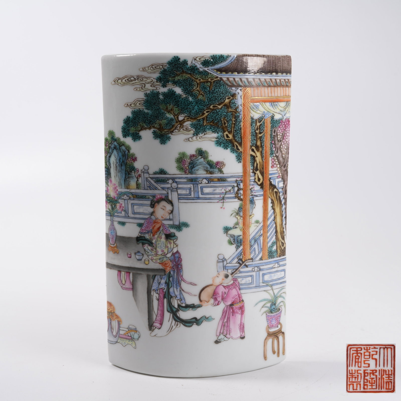 A FAMILLE ROSE ARM REST WITH COURTYARD TEACHING PATTERN: Famille Rose Arm Rest with Courtyard Teaching Pattern