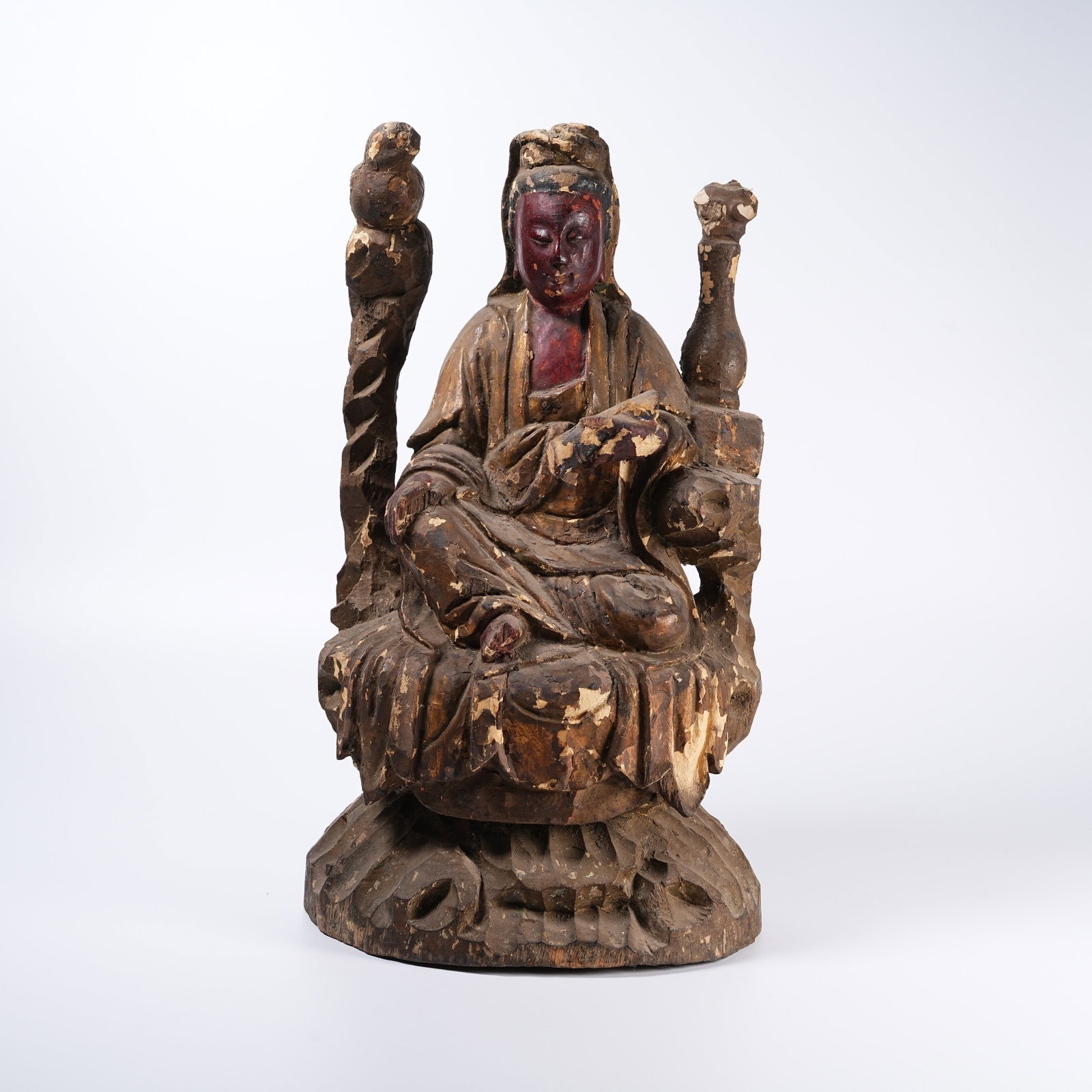 A PAINTED WOOD SCROLL-HOLDING GUANYIN STATUE: Painted Wood Scroll-holding Guanyin Statue