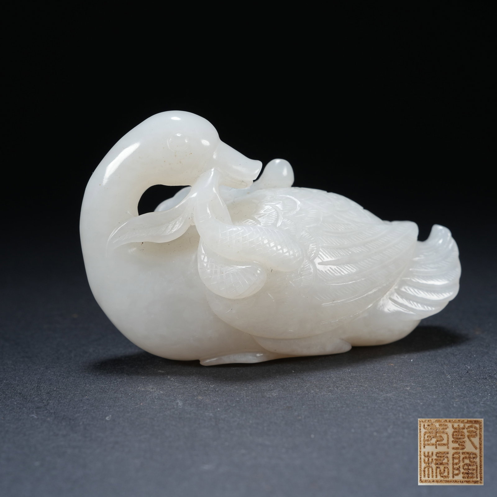 A HETIAN JADE GANODERMA RUYI PRECIOUS GOOSE HAND PIECE: Hetian Jade Ganoderma Ruyi Precious Goose Hand Piece