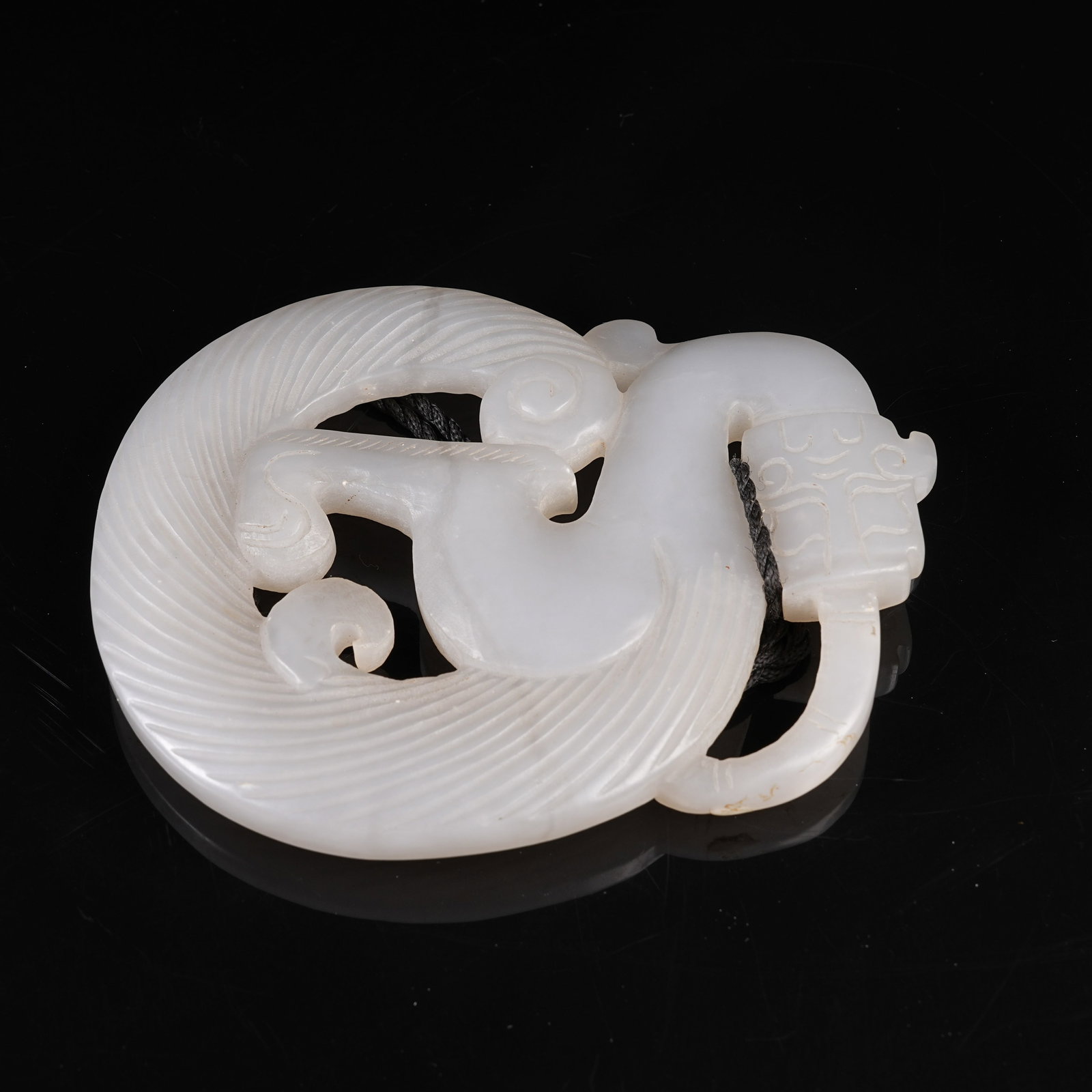 A NEPHRITE CHI DRAGON PENDANT (1 of 8)