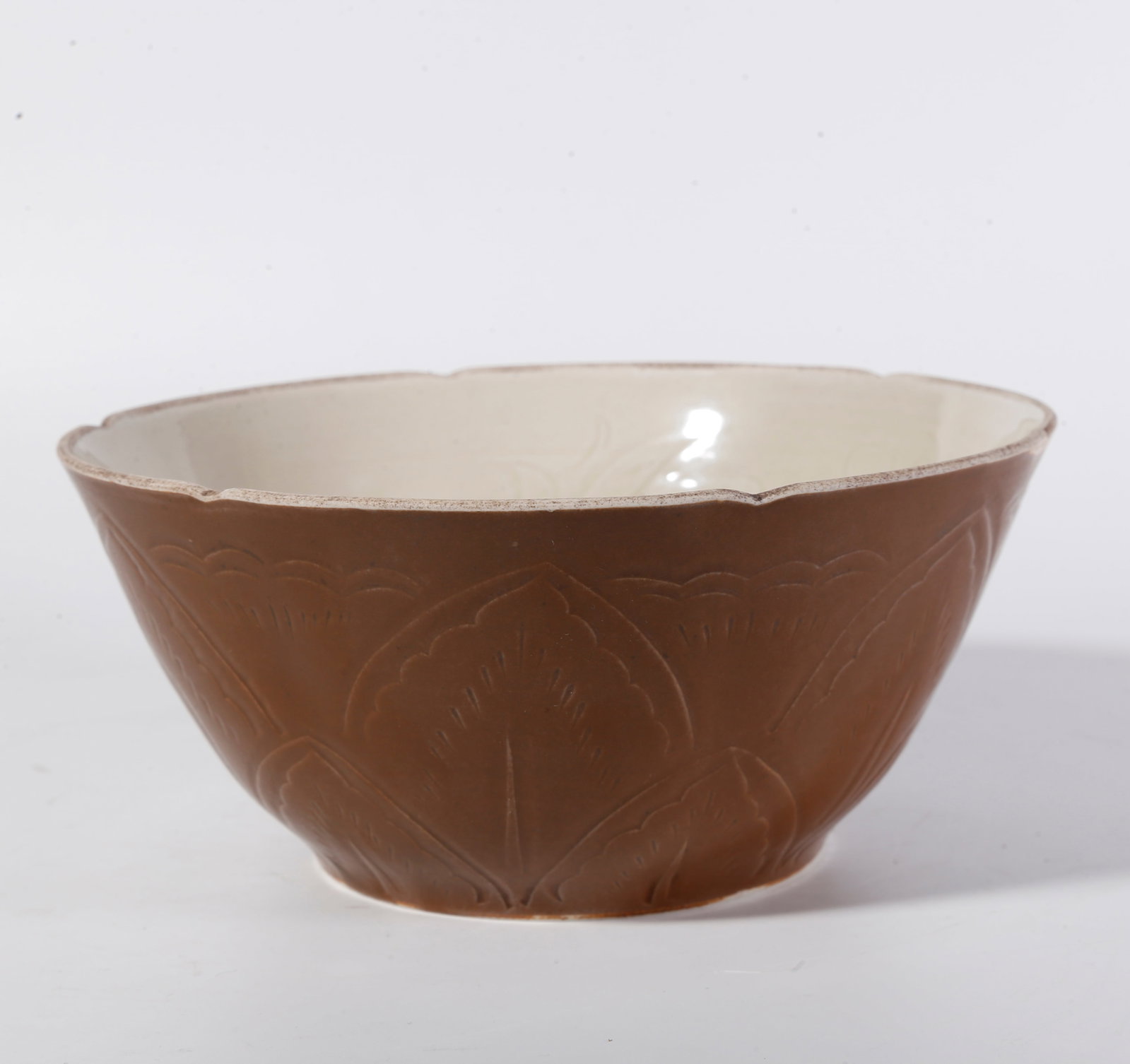A DING KILN BOWL WITH FLORAL PATTERNS (1 of 10)